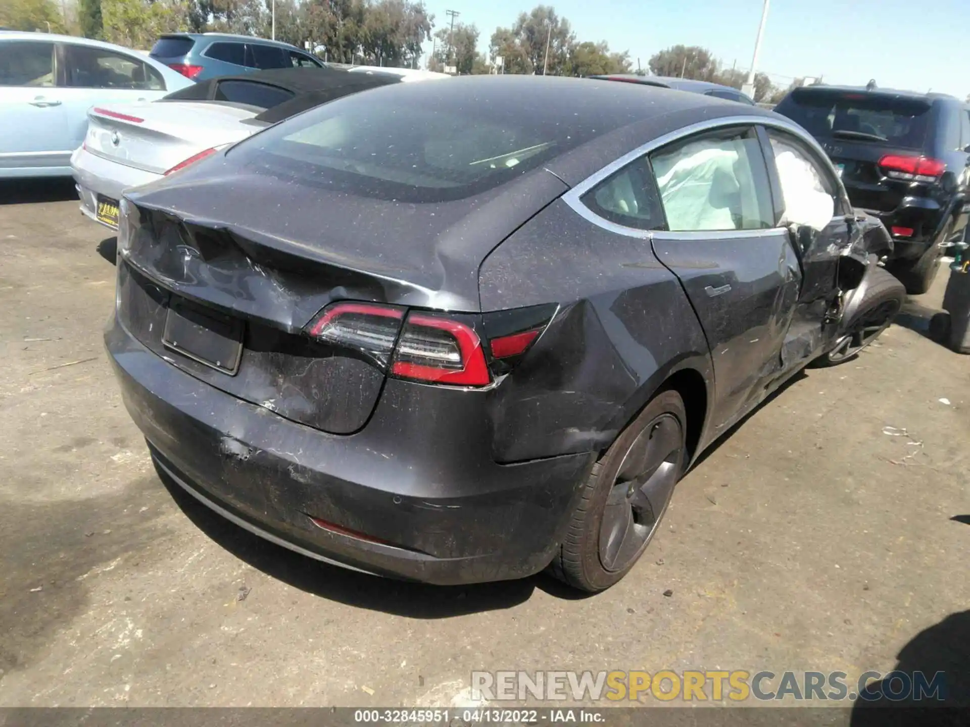 4 Photograph of a damaged car 5YJ3E1EA9LF613097 TESLA MODEL 3 2020