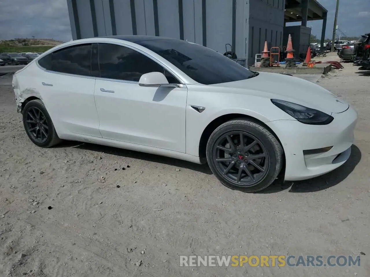 4 Photograph of a damaged car 5YJ3E1EA9LF613746 TESLA MODEL 3 2020