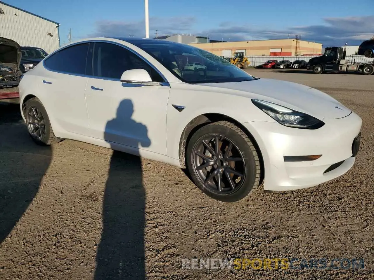 4 Photograph of a damaged car 5YJ3E1EA9LF625475 TESLA MODEL 3 2020