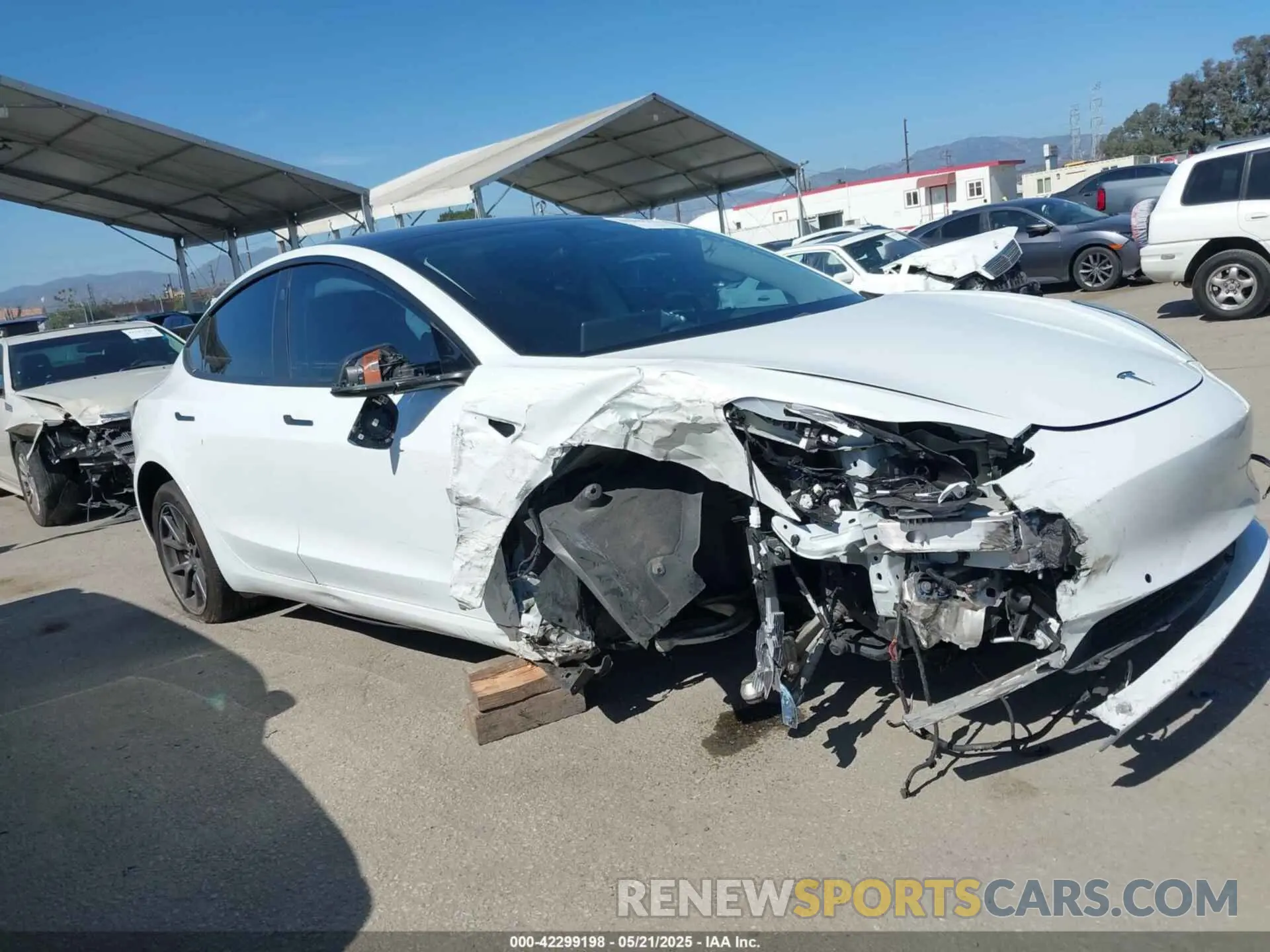 12 Photograph of a damaged car 5YJ3E1EA9LF632443 TESLA MODEL 3 2020