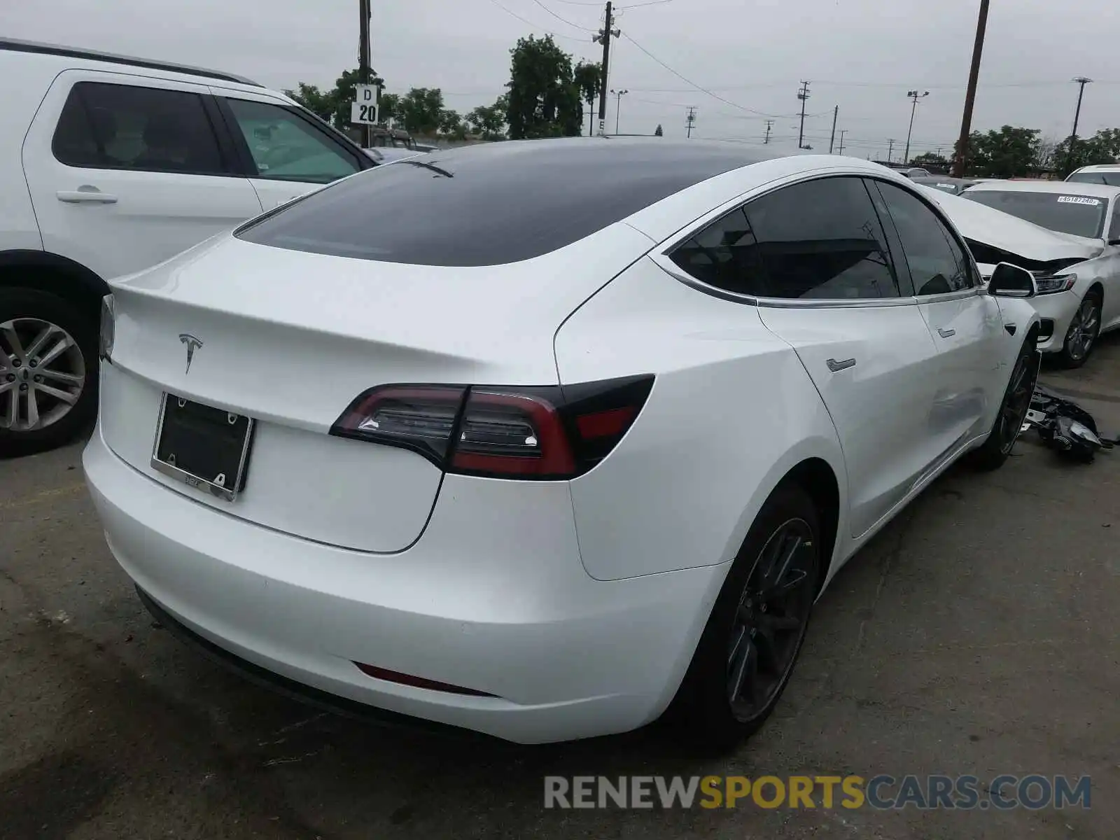 4 Photograph of a damaged car 5YJ3E1EA9LF634788 TESLA MODEL 3 2020