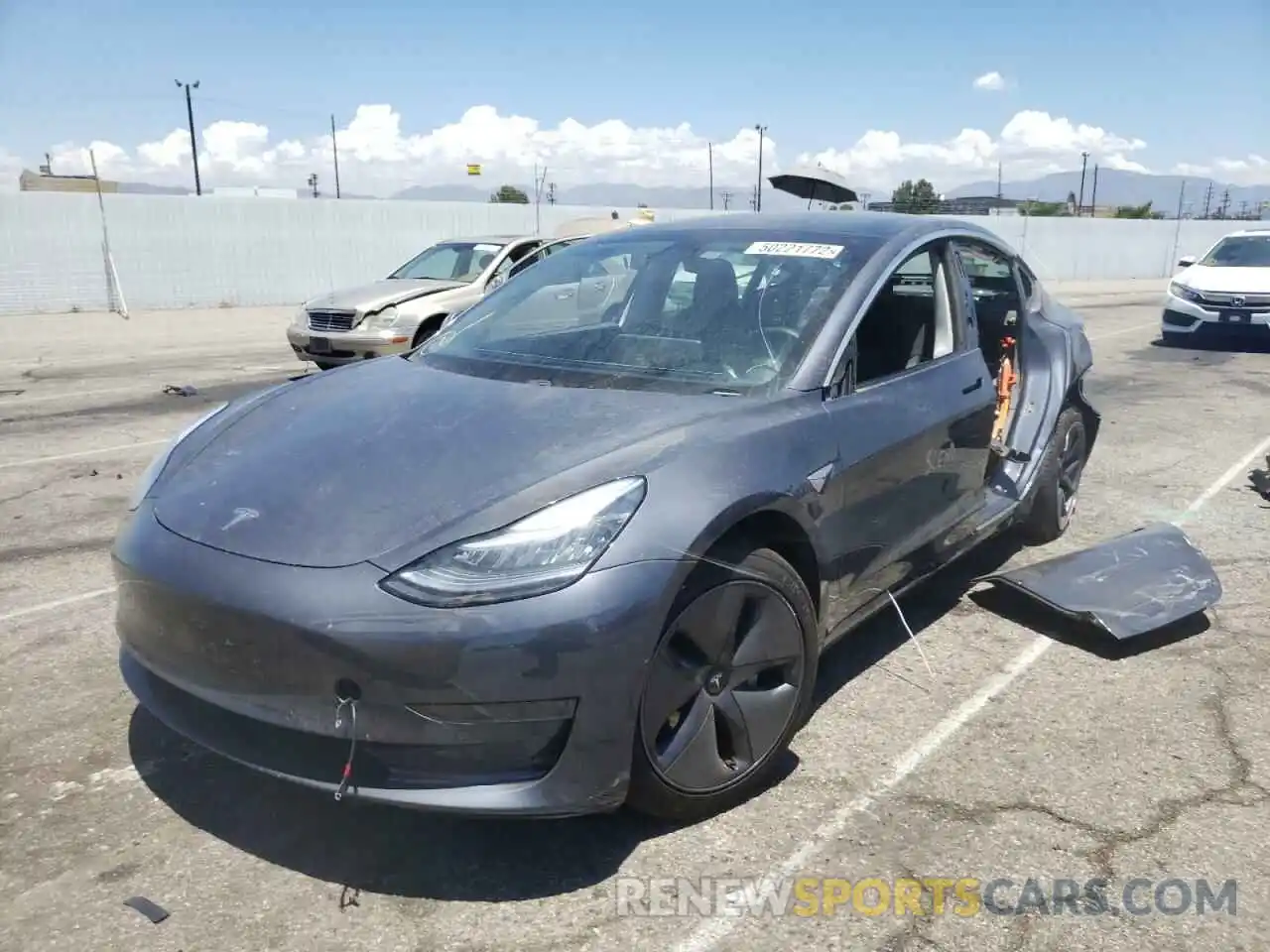 2 Photograph of a damaged car 5YJ3E1EA9LF643913 TESLA MODEL 3 2020