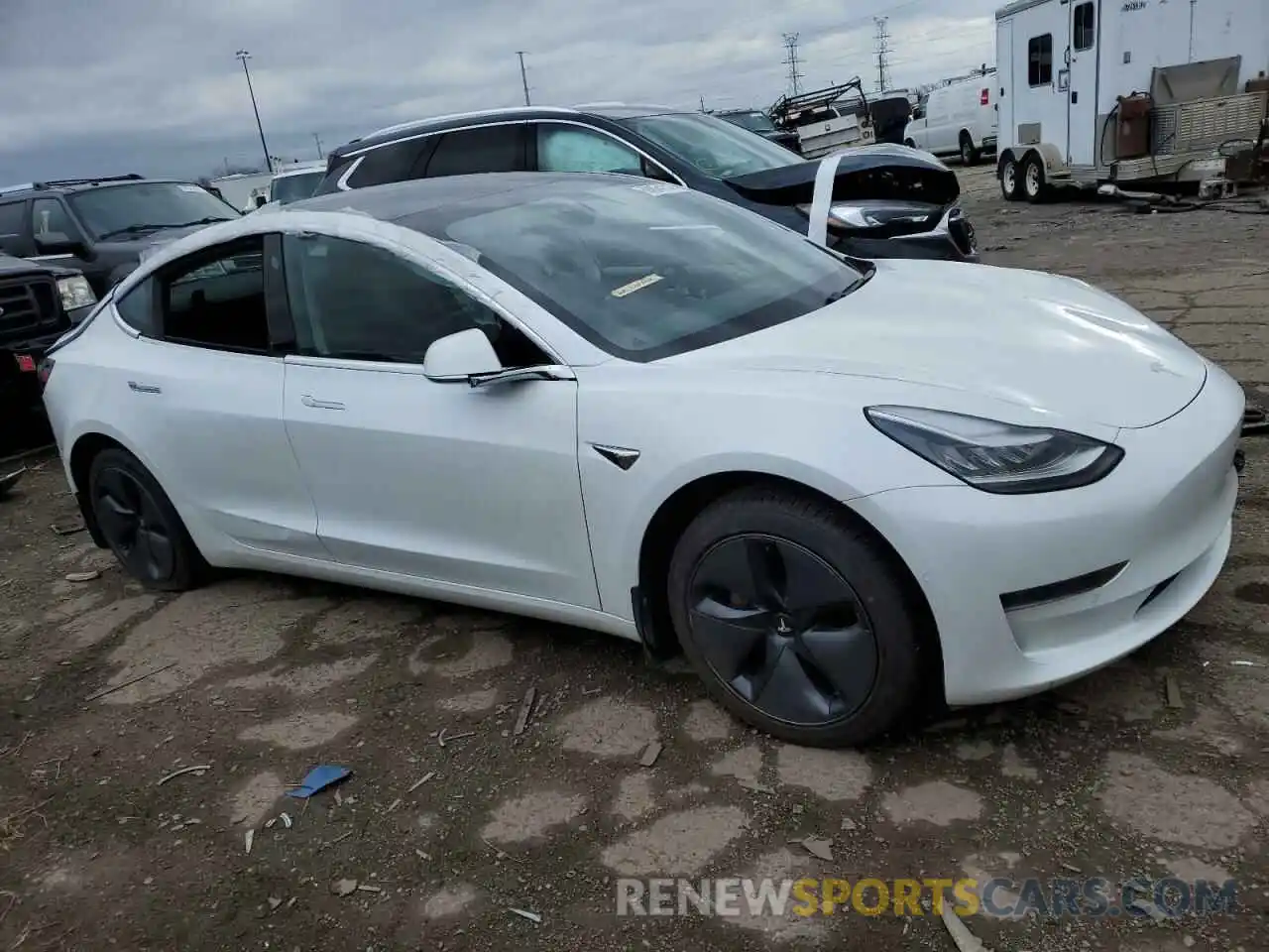 4 Photograph of a damaged car 5YJ3E1EA9LF645130 TESLA MODEL 3 2020