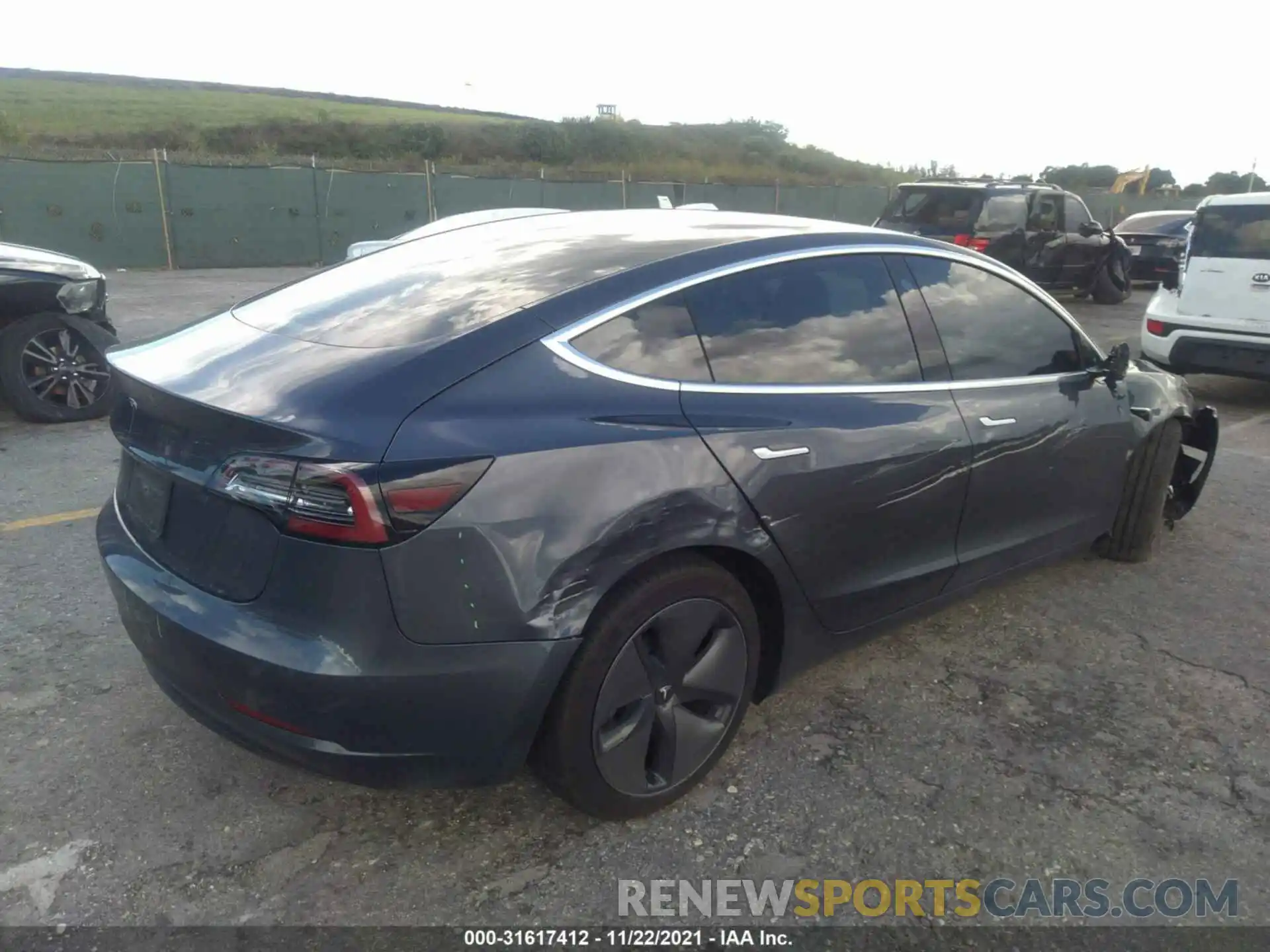 4 Photograph of a damaged car 5YJ3E1EA9LF657925 TESLA MODEL 3 2020