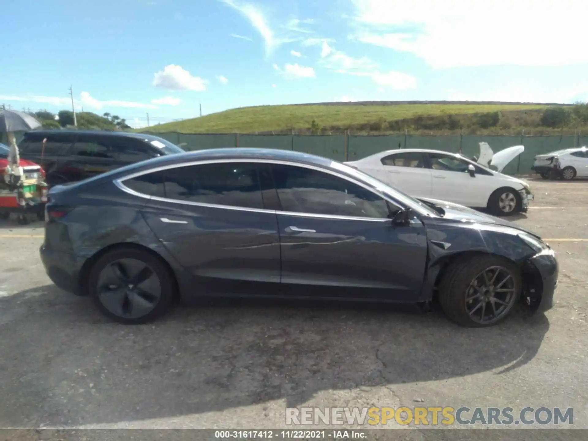 6 Photograph of a damaged car 5YJ3E1EA9LF657925 TESLA MODEL 3 2020