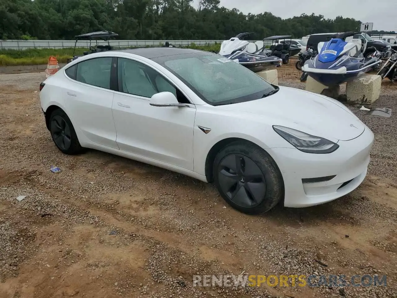 4 Photograph of a damaged car 5YJ3E1EA9LF703673 TESLA MODEL 3 2020