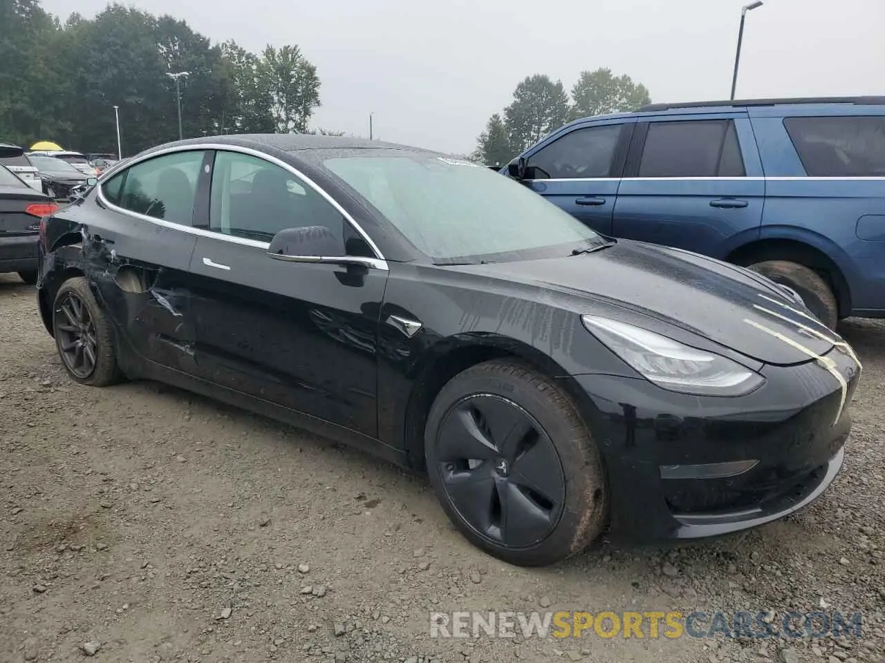 4 Photograph of a damaged car 5YJ3E1EA9LF704466 TESLA MODEL 3 2020