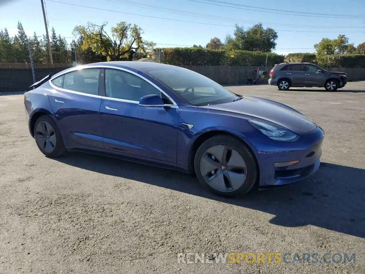 4 Photograph of a damaged car 5YJ3E1EA9LF705830 TESLA MODEL 3 2020