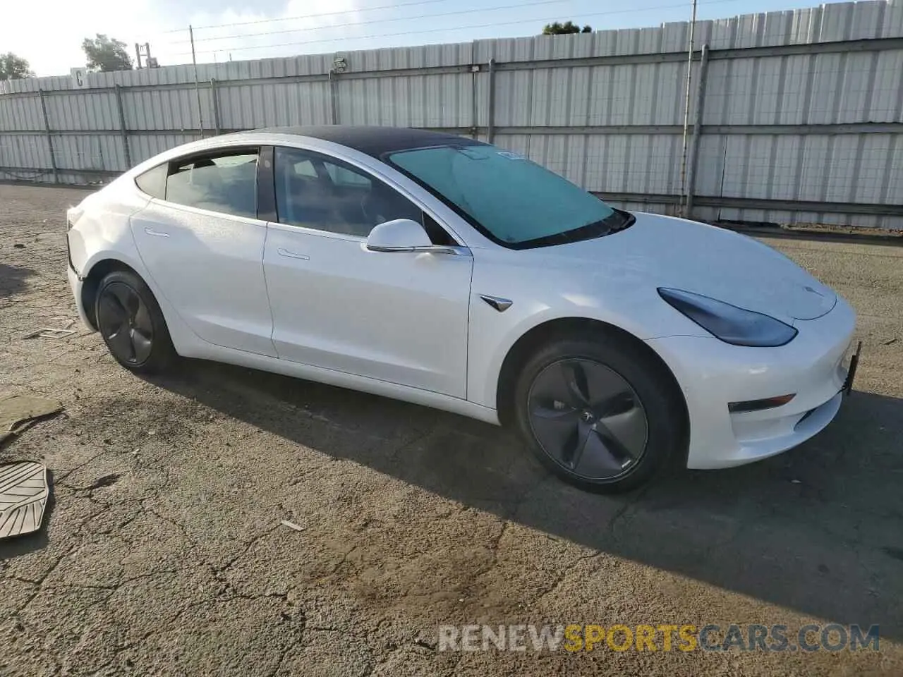 4 Photograph of a damaged car 5YJ3E1EA9LF706573 TESLA MODEL 3 2020
