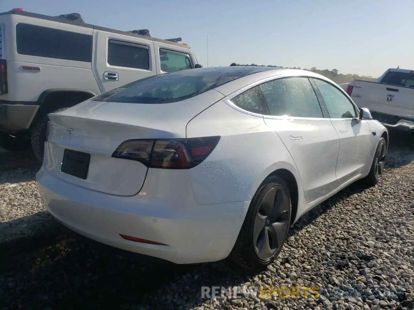 4 Photograph of a damaged car 5YJ3E1EA9LF785937 TESLA MODEL 3 2020