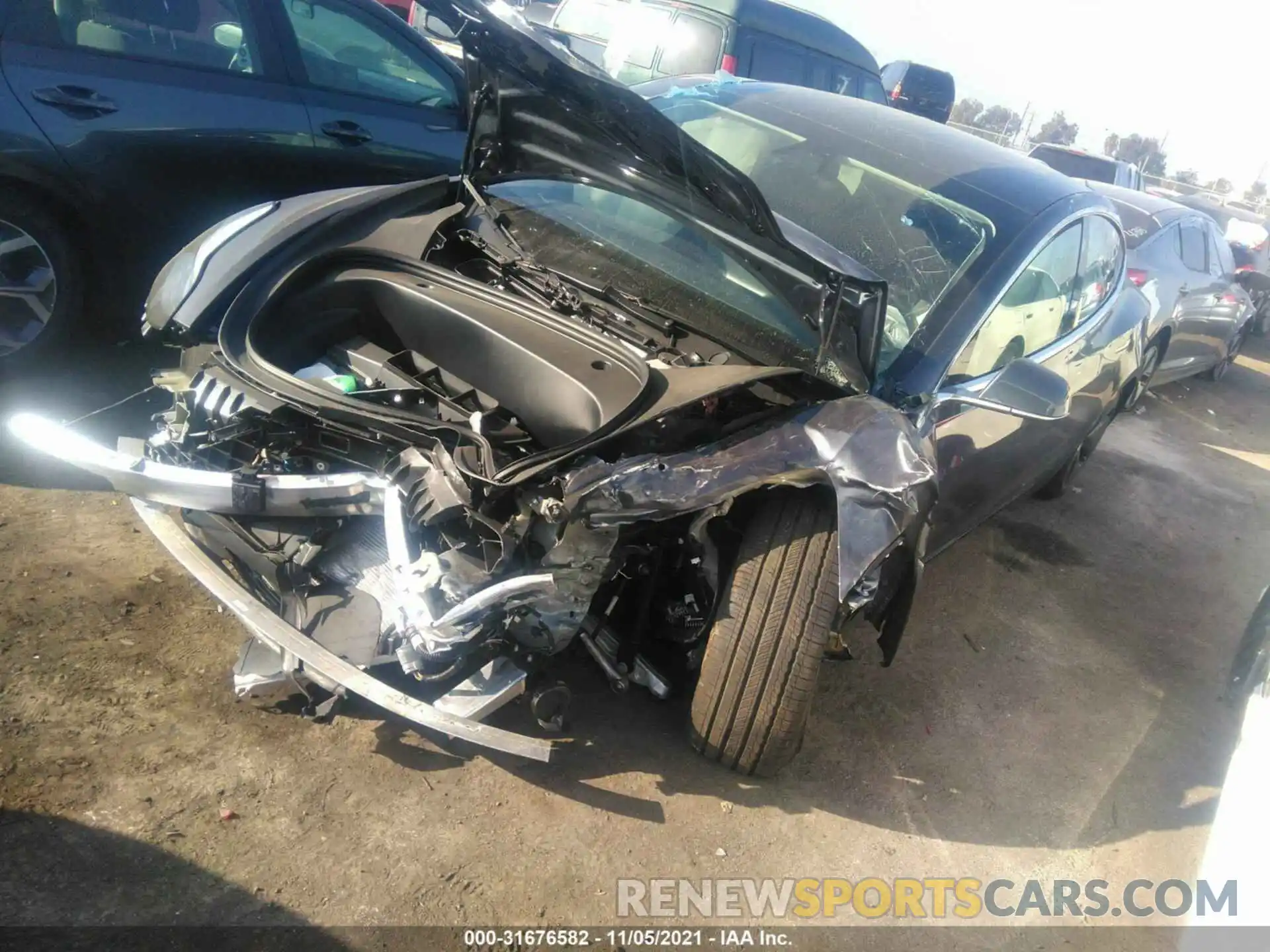 2 Photograph of a damaged car 5YJ3E1EA9LF803577 TESLA MODEL 3 2020