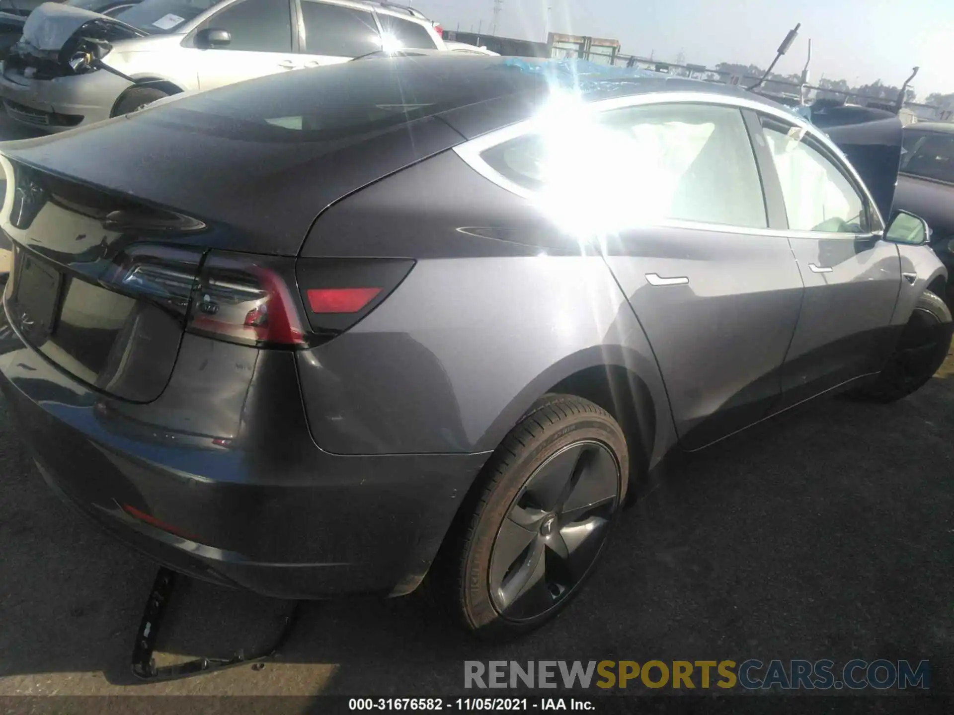 4 Photograph of a damaged car 5YJ3E1EA9LF803577 TESLA MODEL 3 2020