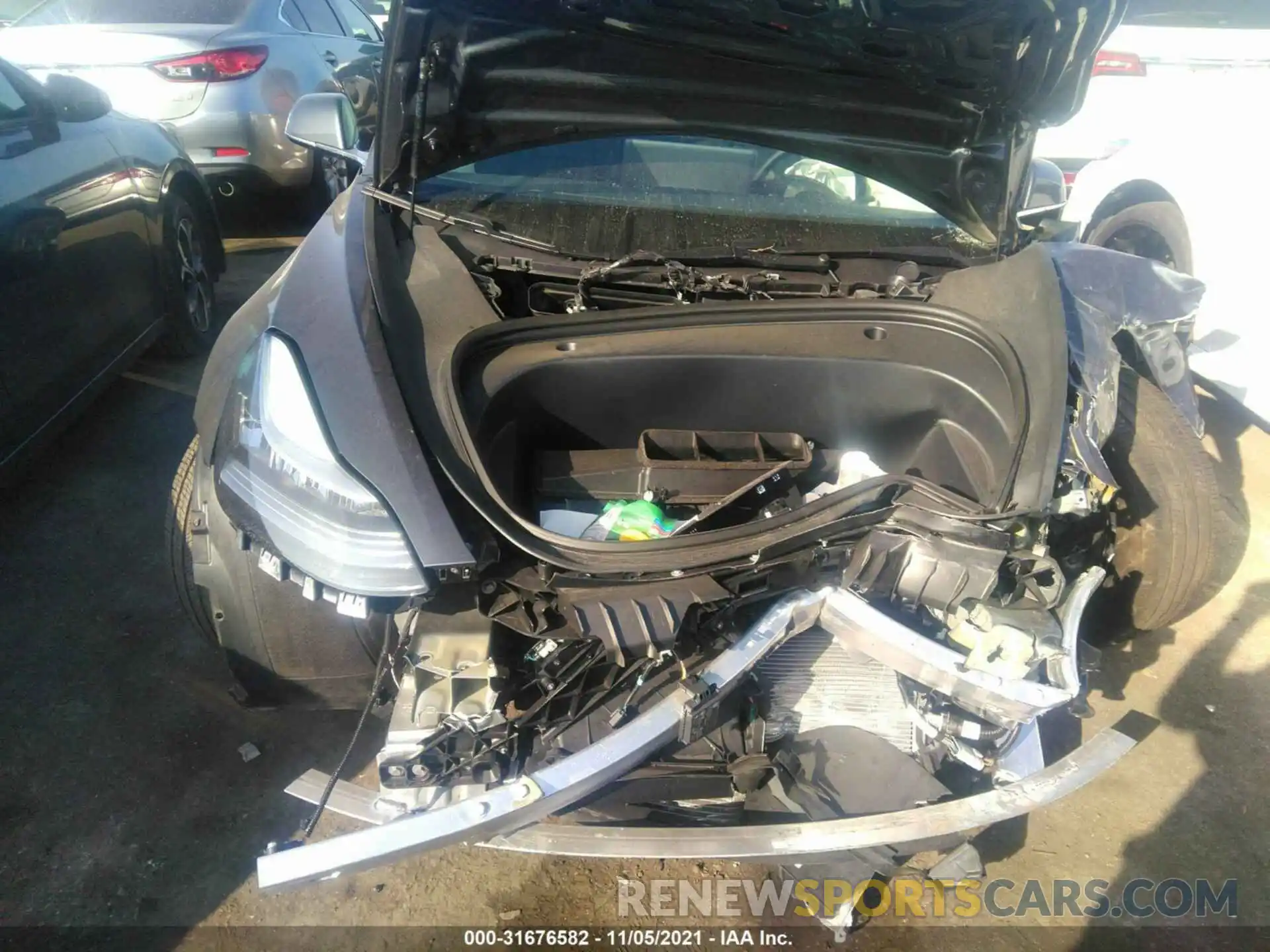 6 Photograph of a damaged car 5YJ3E1EA9LF803577 TESLA MODEL 3 2020