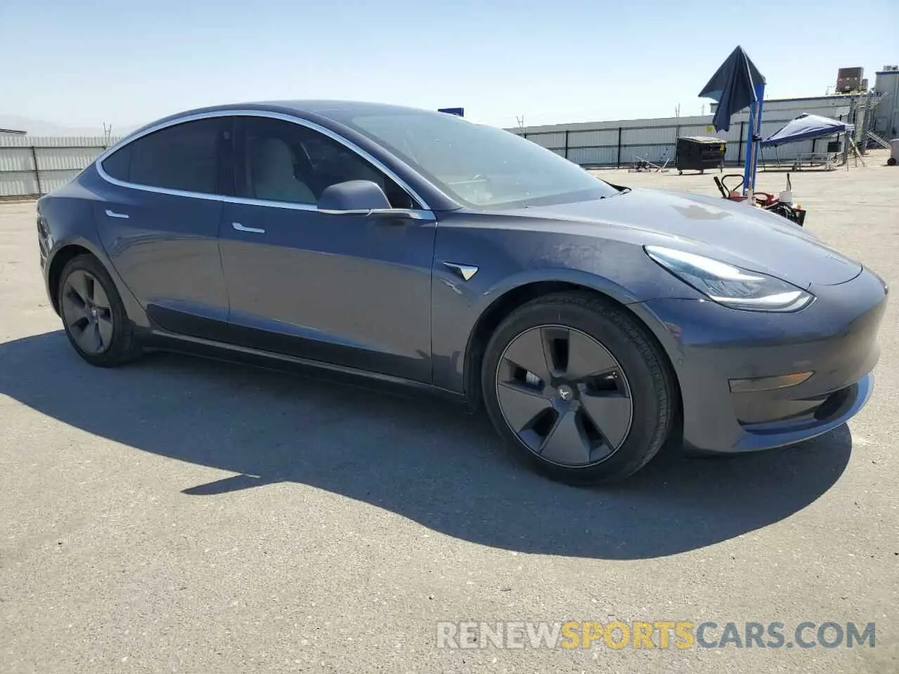 4 Photograph of a damaged car 5YJ3E1EAXLF530407 TESLA MODEL 3 2020