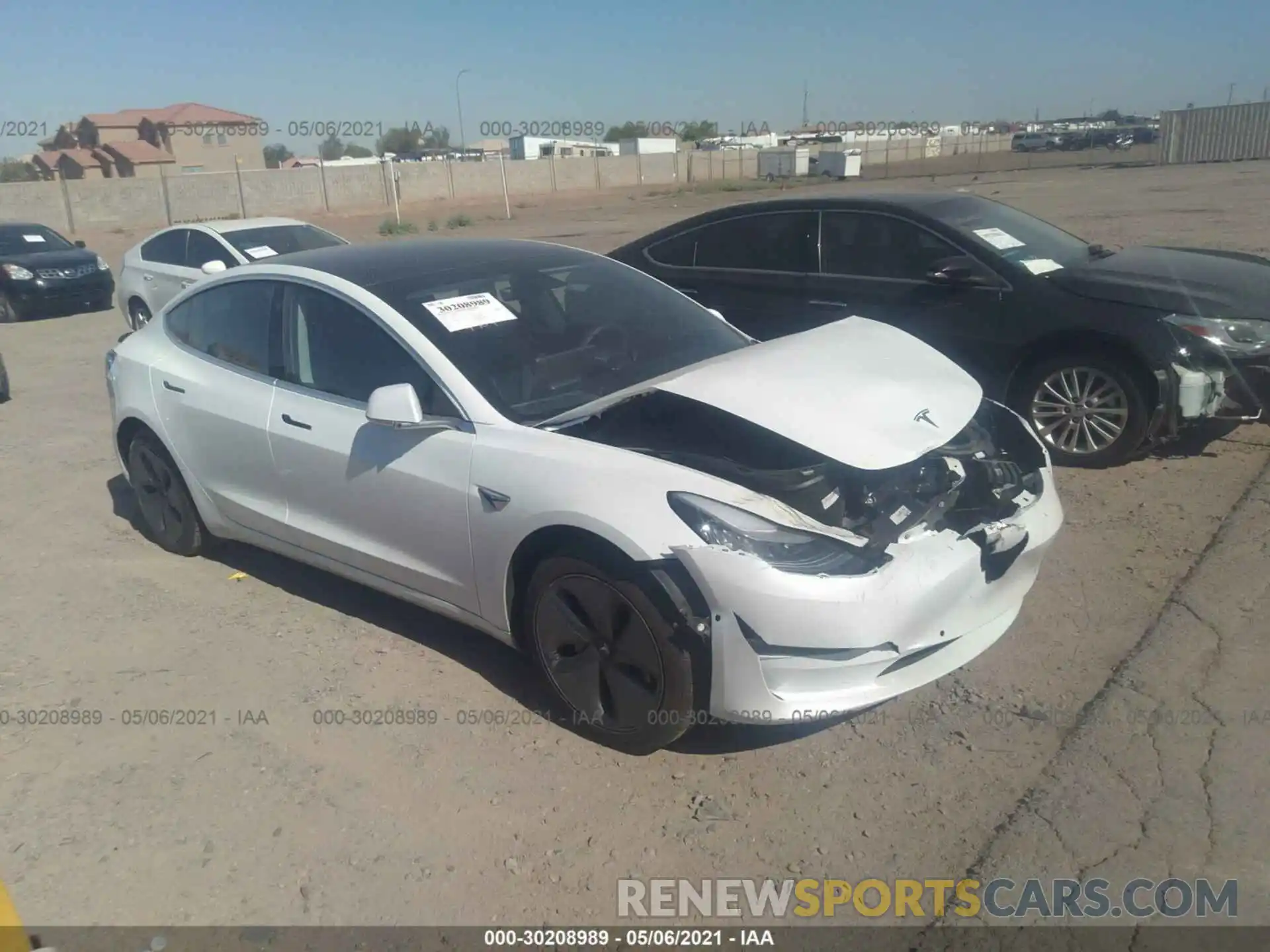 1 Photograph of a damaged car 5YJ3E1EAXLF597704 TESLA MODEL 3 2020