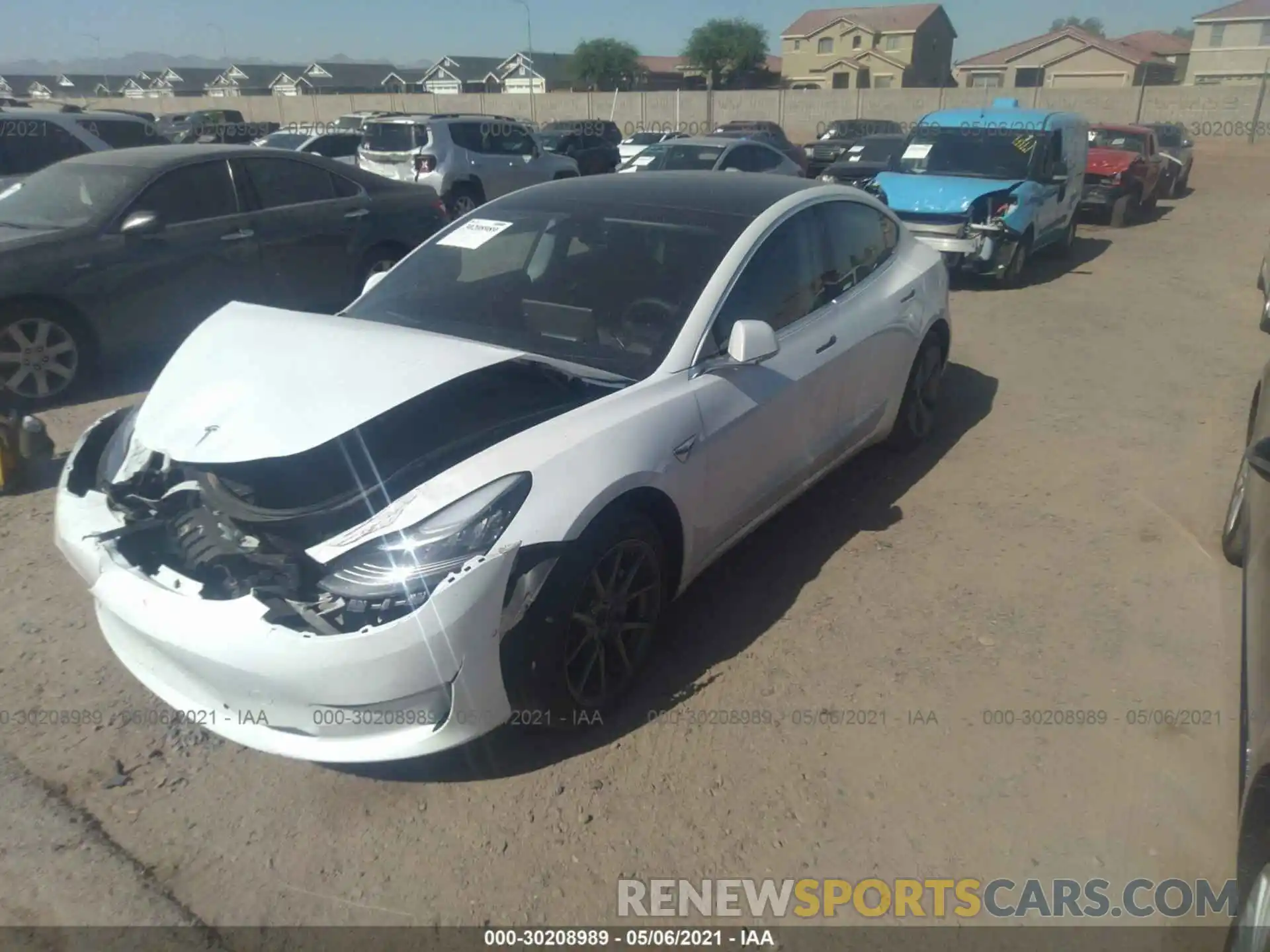 2 Photograph of a damaged car 5YJ3E1EAXLF597704 TESLA MODEL 3 2020