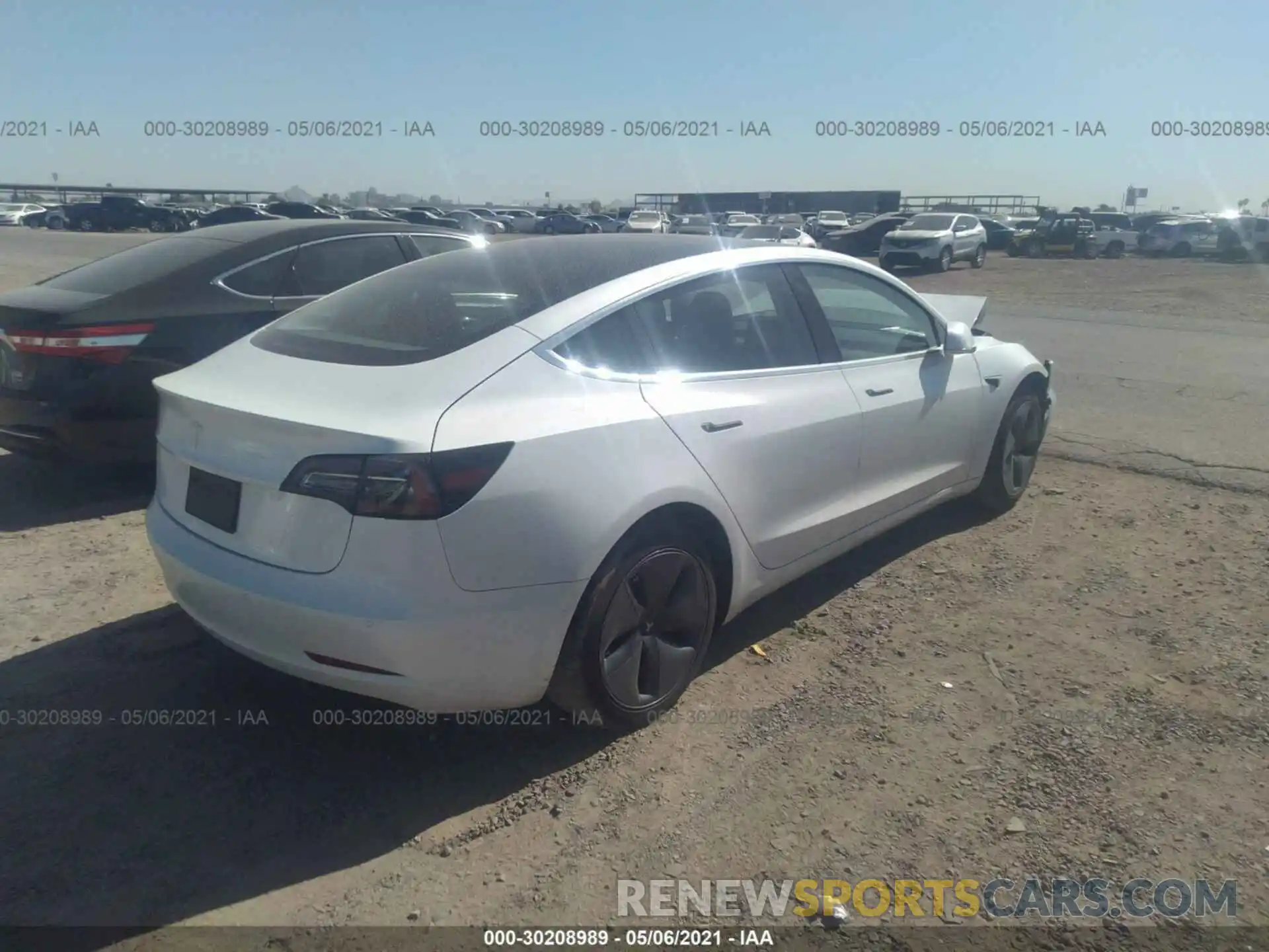 4 Photograph of a damaged car 5YJ3E1EAXLF597704 TESLA MODEL 3 2020