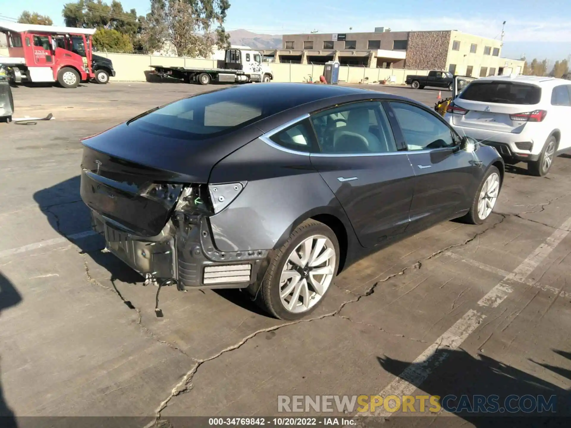 4 Photograph of a damaged car 5YJ3E1EAXLF606823 TESLA MODEL 3 2020