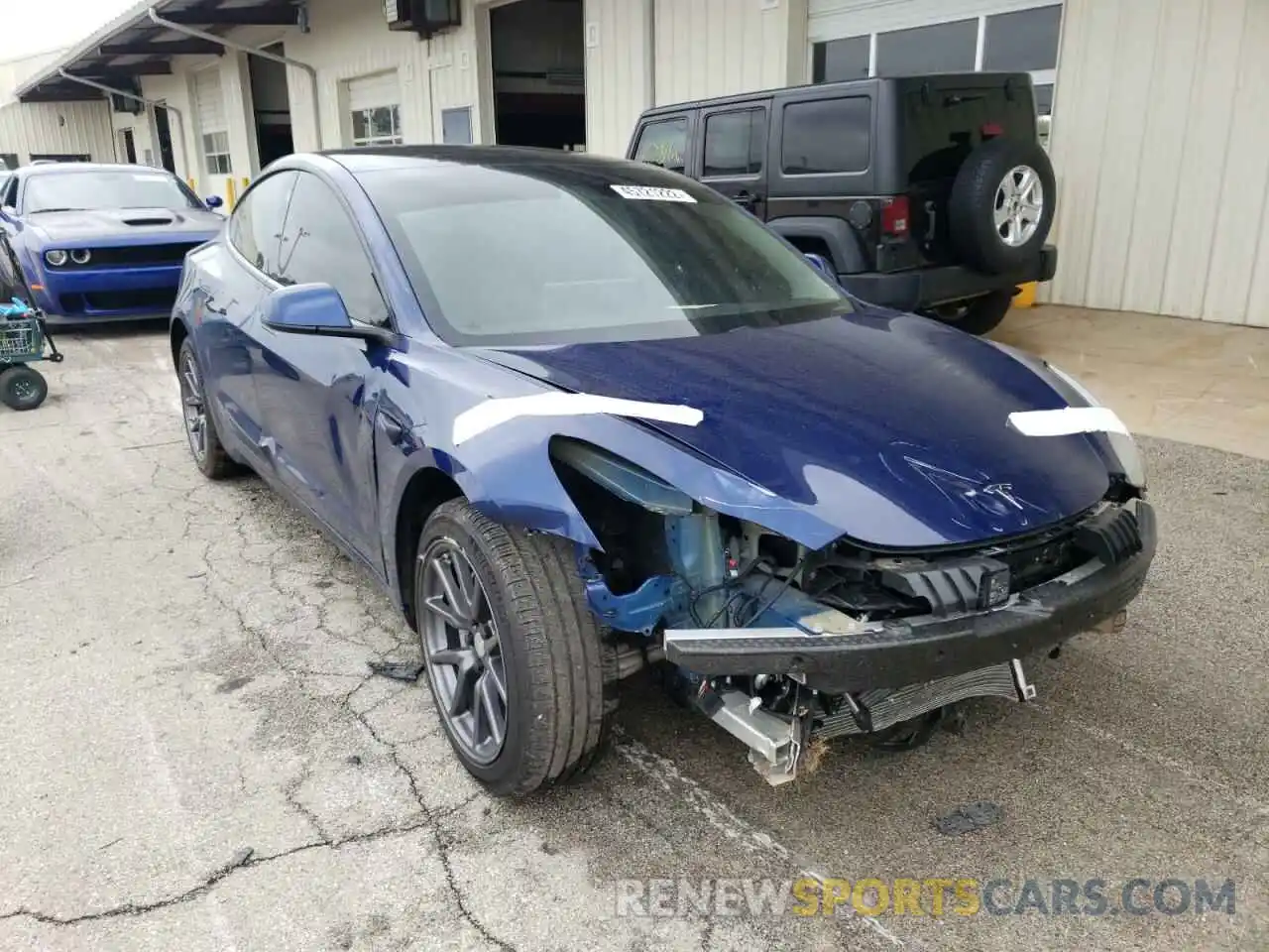 1 Photograph of a damaged car 5YJ3E1EAXLF609303 TESLA MODEL 3 2020