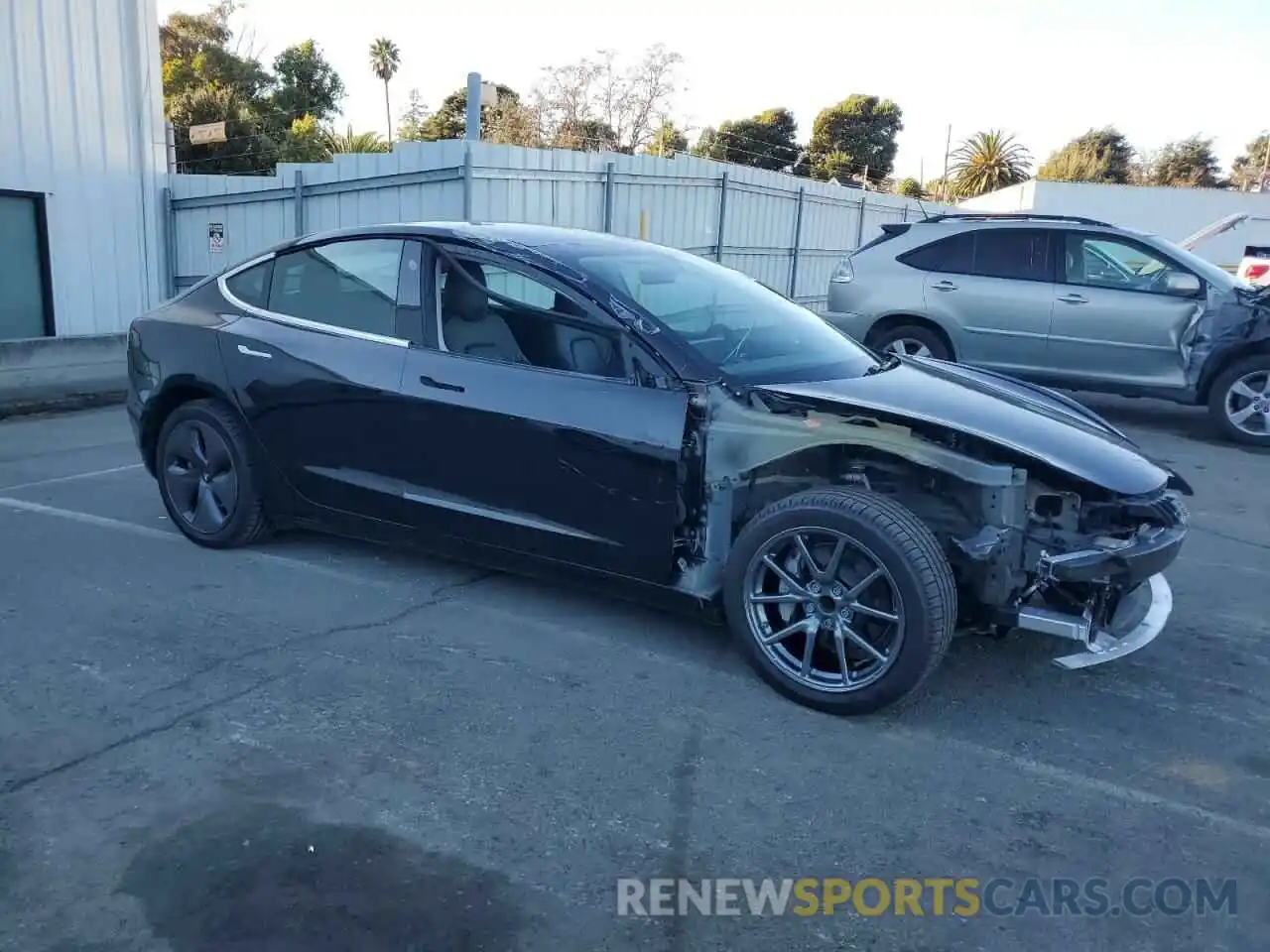 4 Photograph of a damaged car 5YJ3E1EAXLF611231 TESLA MODEL 3 2020