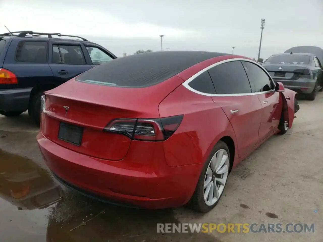 4 Photograph of a damaged car 5YJ3E1EAXLF710230 TESLA MODEL 3 2020