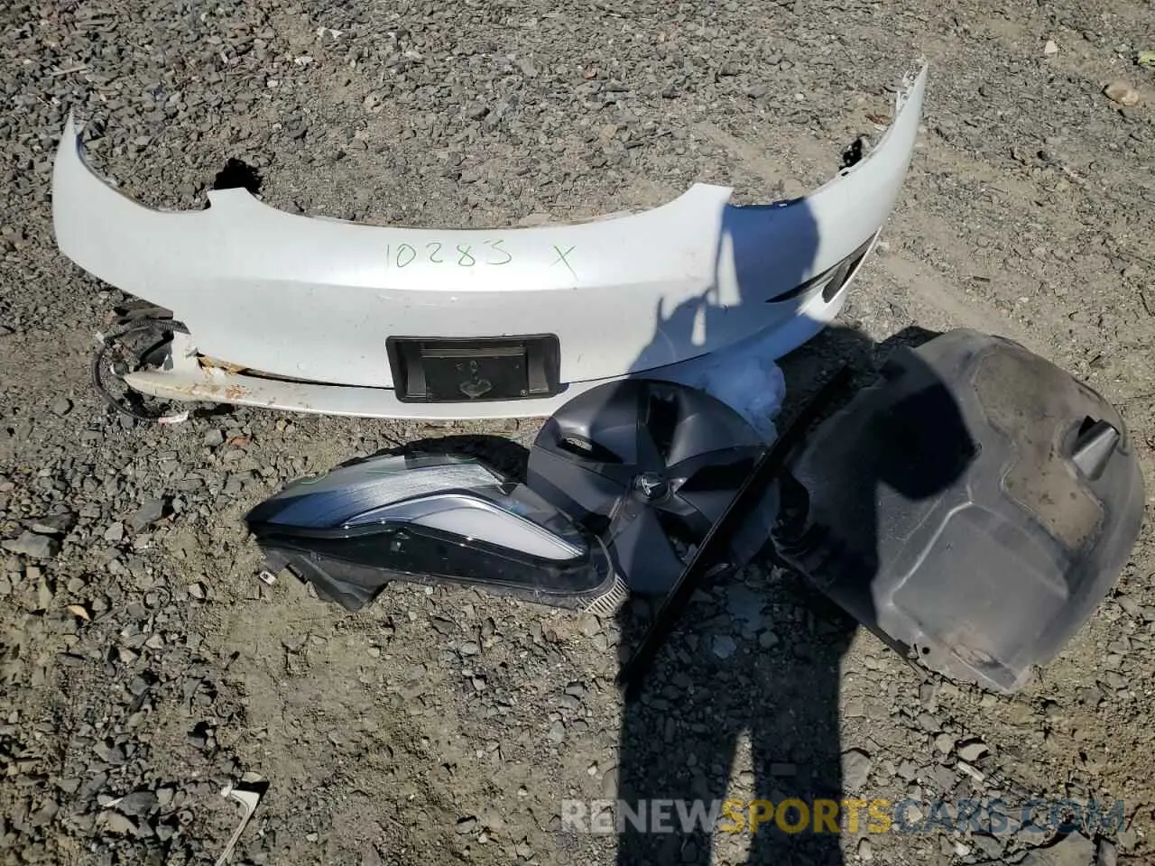 12 Photograph of a damaged car 5YJ3E1EAXLF736973 TESLA MODEL 3 2020