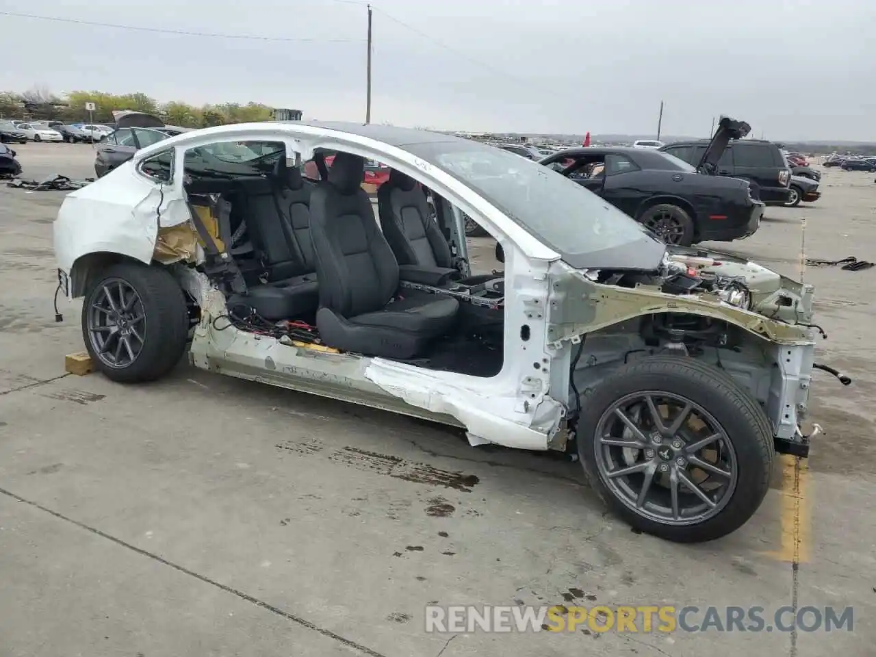 4 Photograph of a damaged car 5YJ3E1EAXLF797000 TESLA MODEL 3 2020