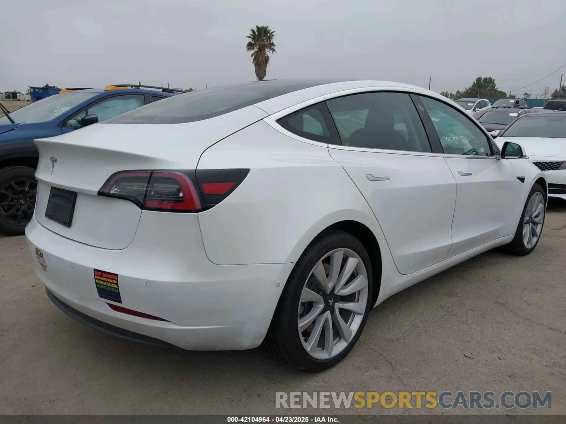 4 Photograph of a damaged car 5YJ3E1EAXLF806438 TESLA MODEL 3 2020