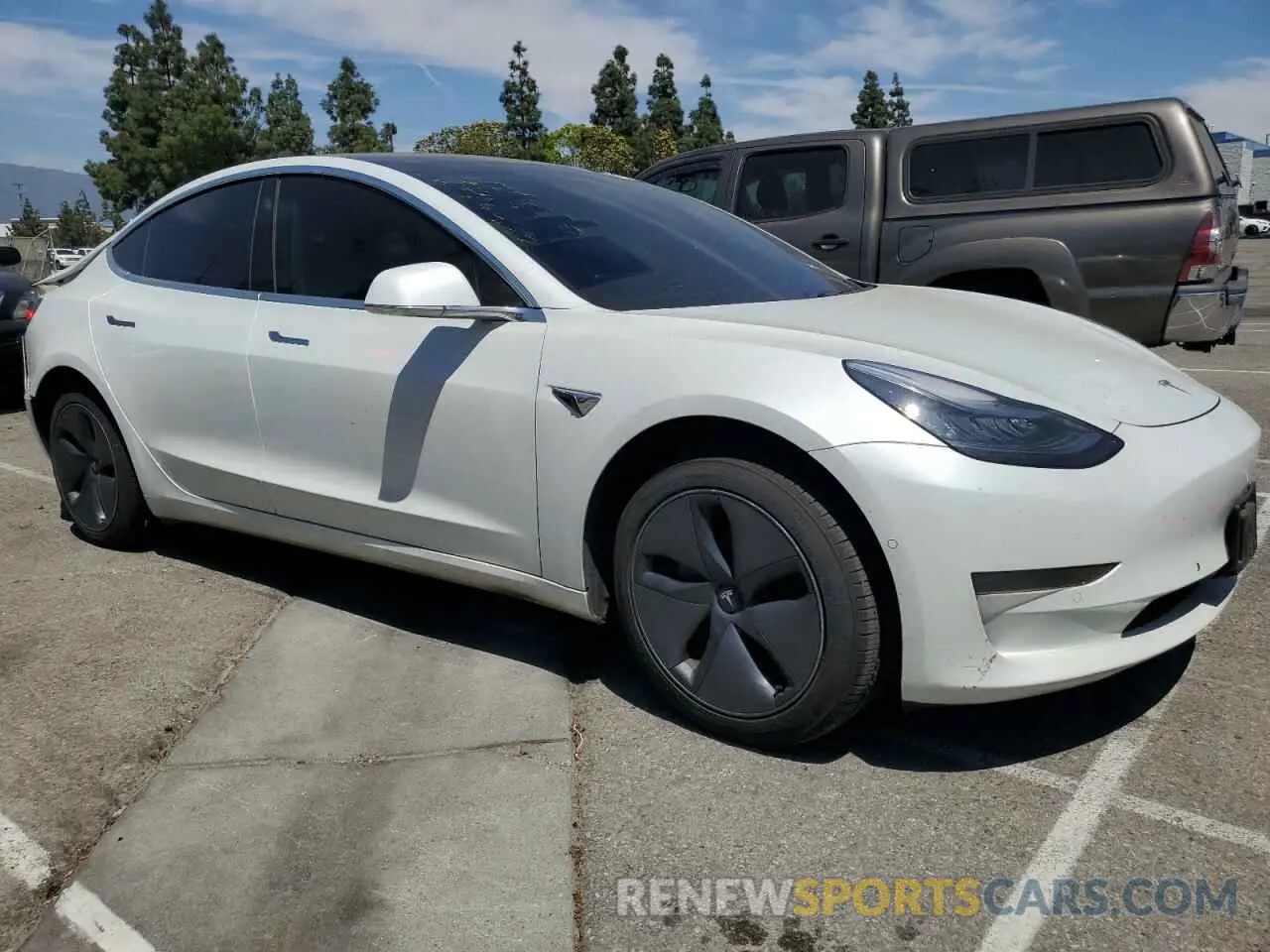 4 Photograph of a damaged car 5YJ3E1EAXLF807556 TESLA MODEL 3 2020