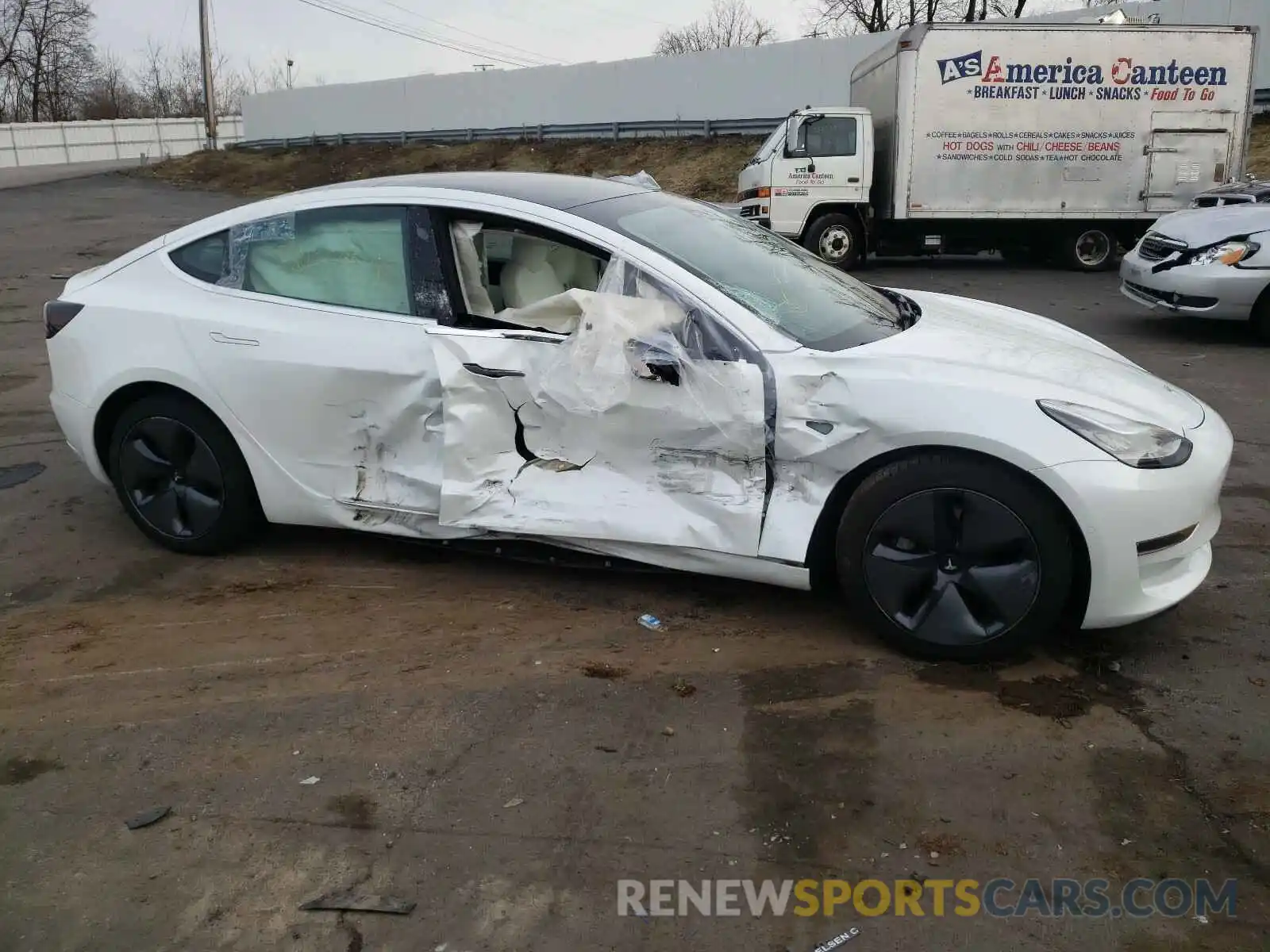 9 Photograph of a damaged car 5YJ3E1EB0LF606998 TESLA MODEL 3 2020