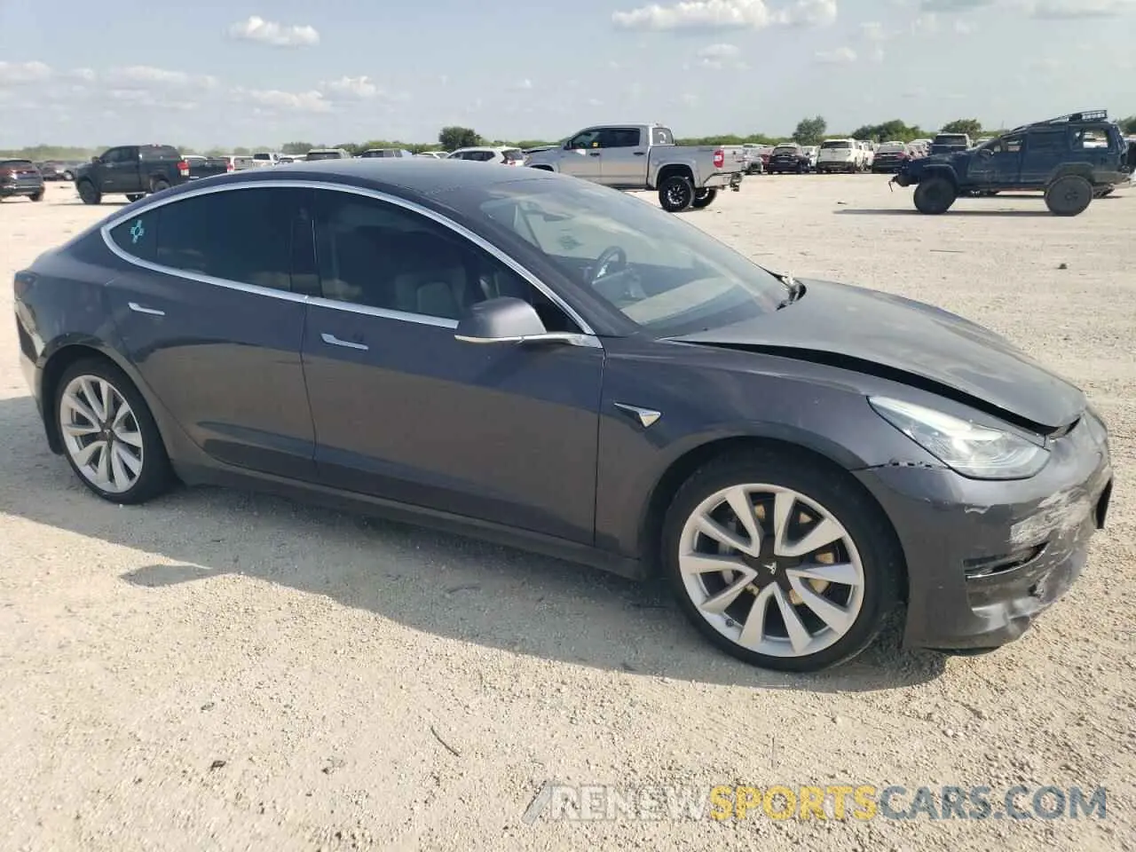 4 Photograph of a damaged car 5YJ3E1EB0LF619864 TESLA MODEL 3 2020
