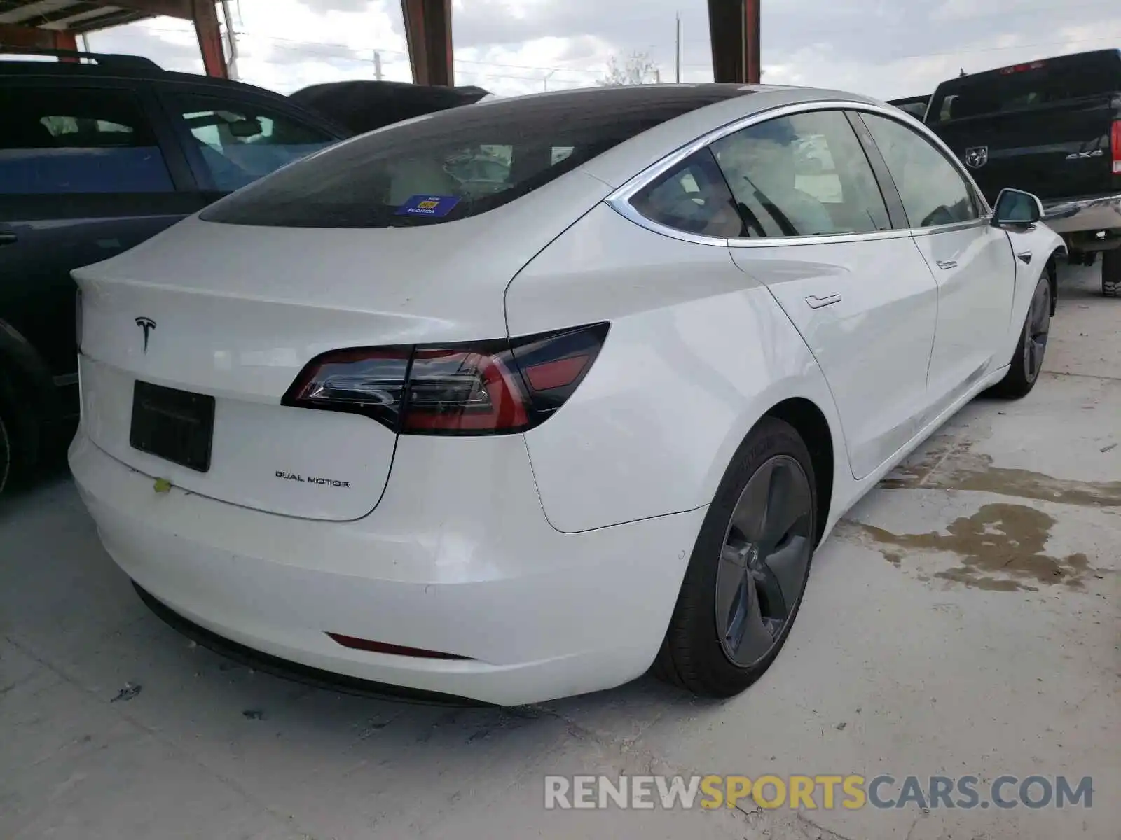 4 Photograph of a damaged car 5YJ3E1EB0LF622067 TESLA MODEL 3 2020