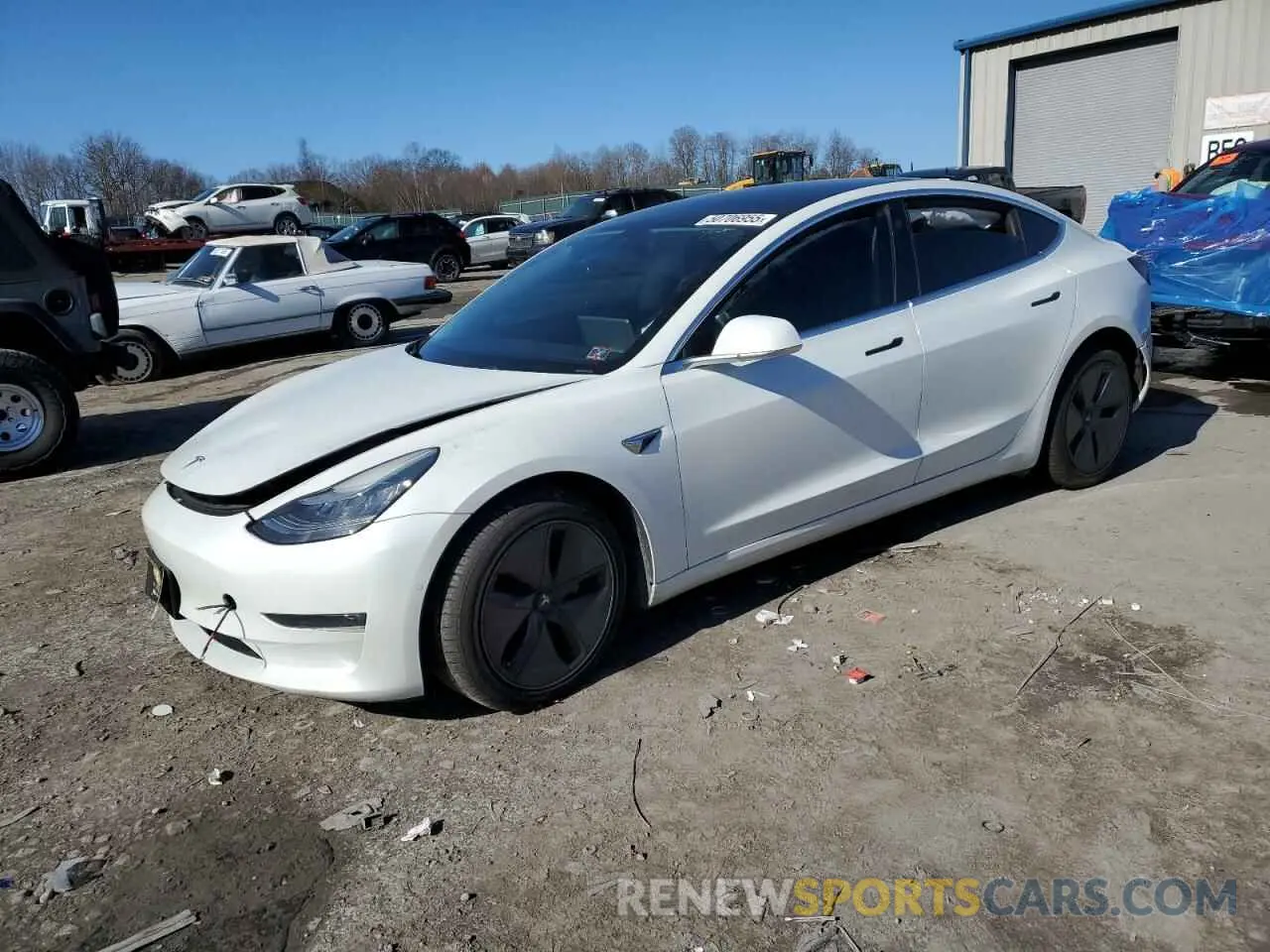 1 Photograph of a damaged car 5YJ3E1EB0LF628130 TESLA MODEL 3 2020
