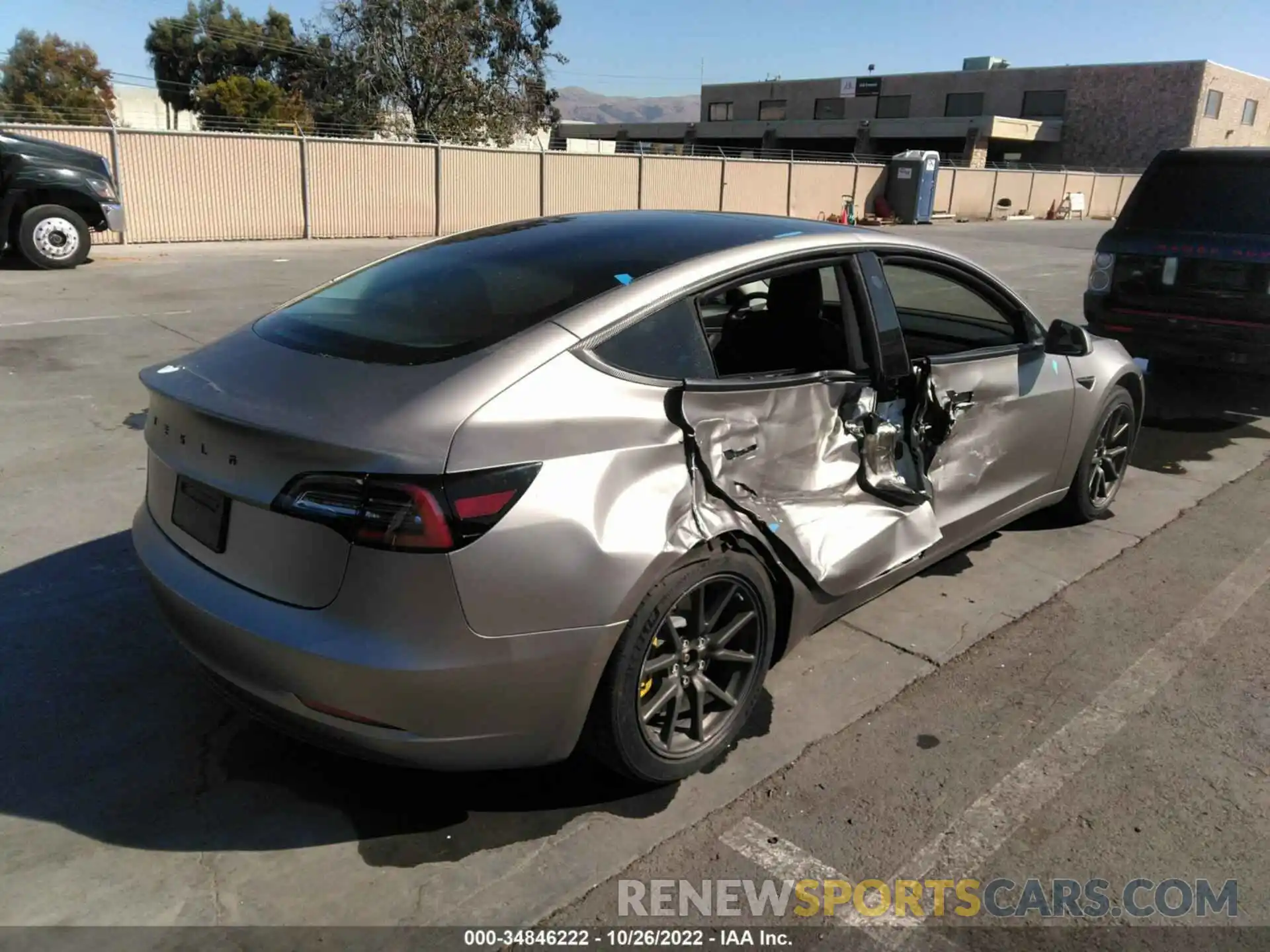 4 Photograph of a damaged car 5YJ3E1EB0LF637040 TESLA MODEL 3 2020