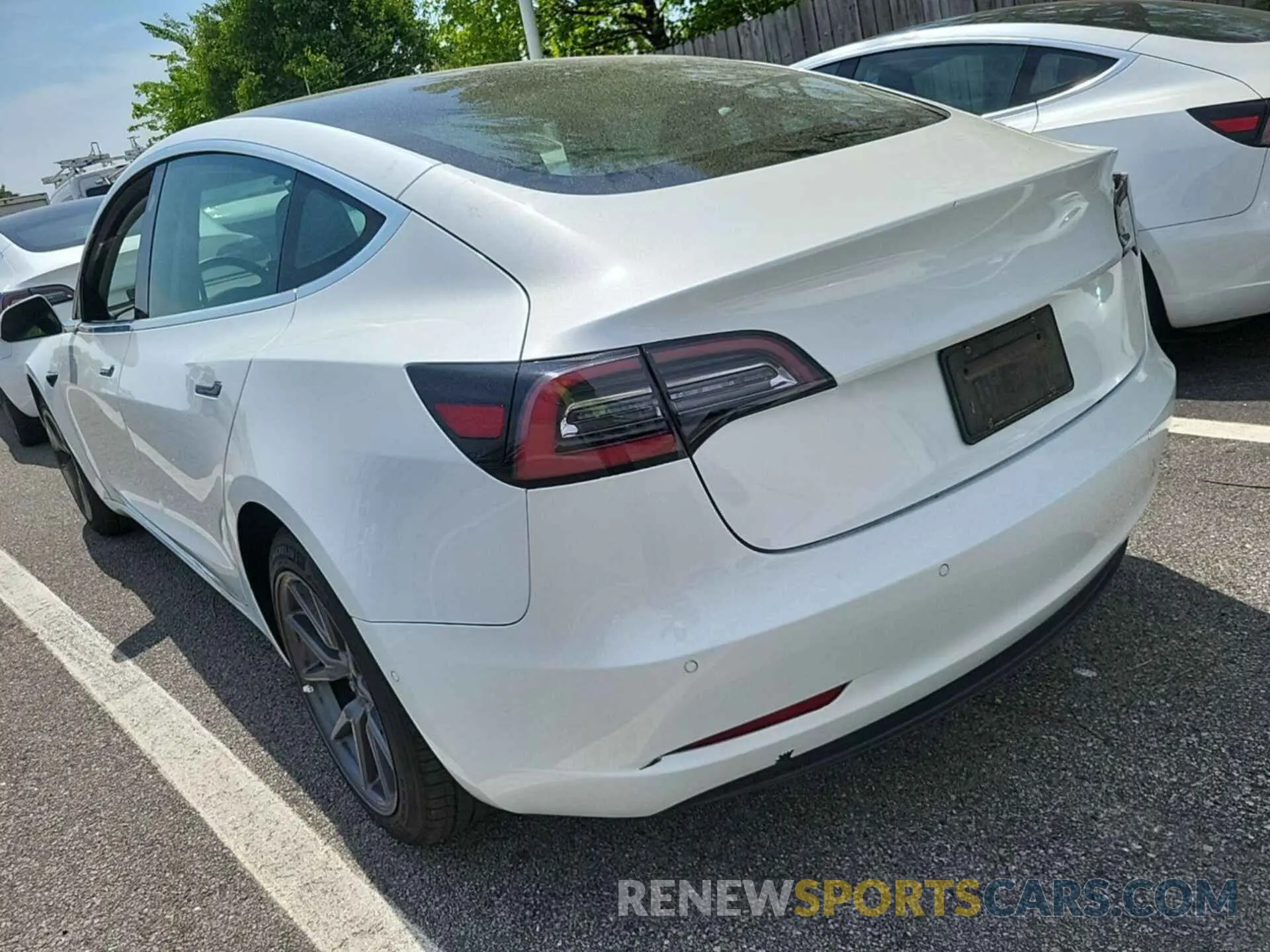31 Photograph of a damaged car 5YJ3E1EB0LF637281 TESLA MODEL 3 2020