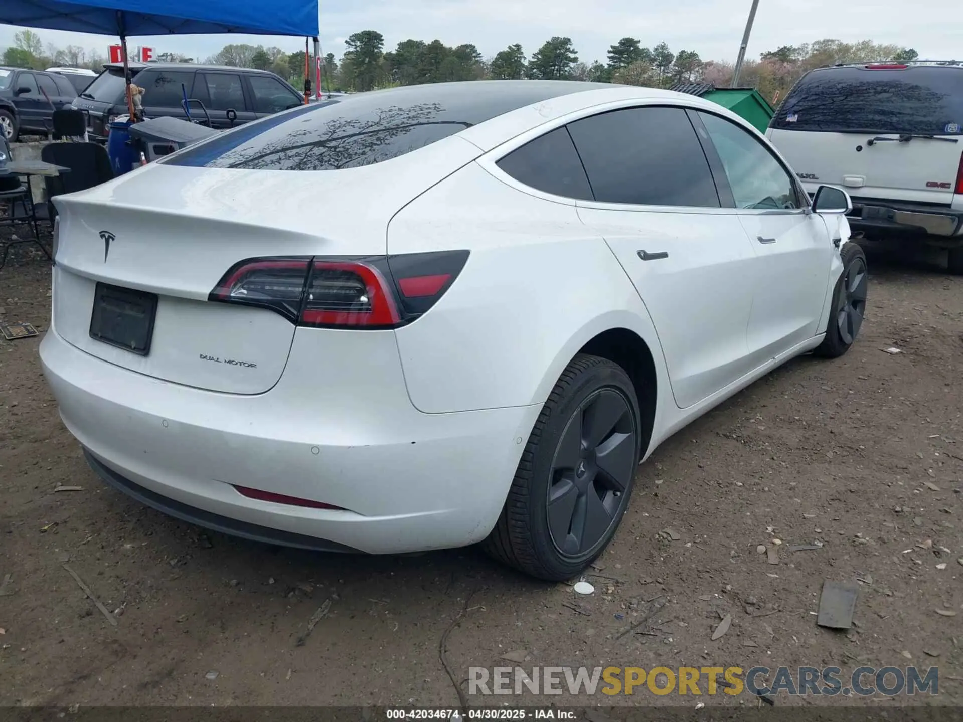 4 Photograph of a damaged car 5YJ3E1EB0LF637491 TESLA MODEL 3 2020