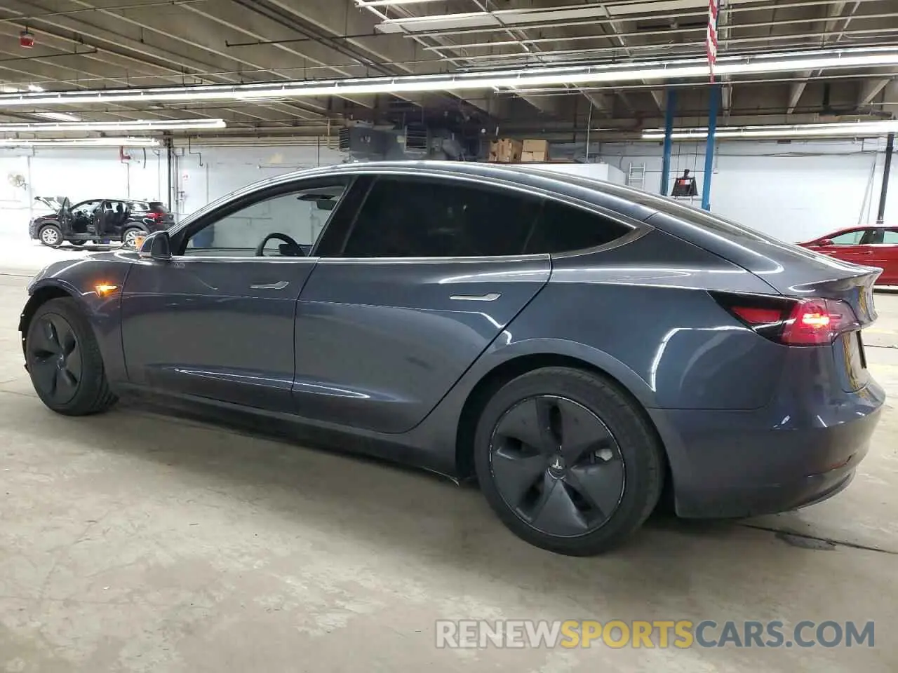 2 Photograph of a damaged car 5YJ3E1EB0LF640052 TESLA MODEL 3 2020