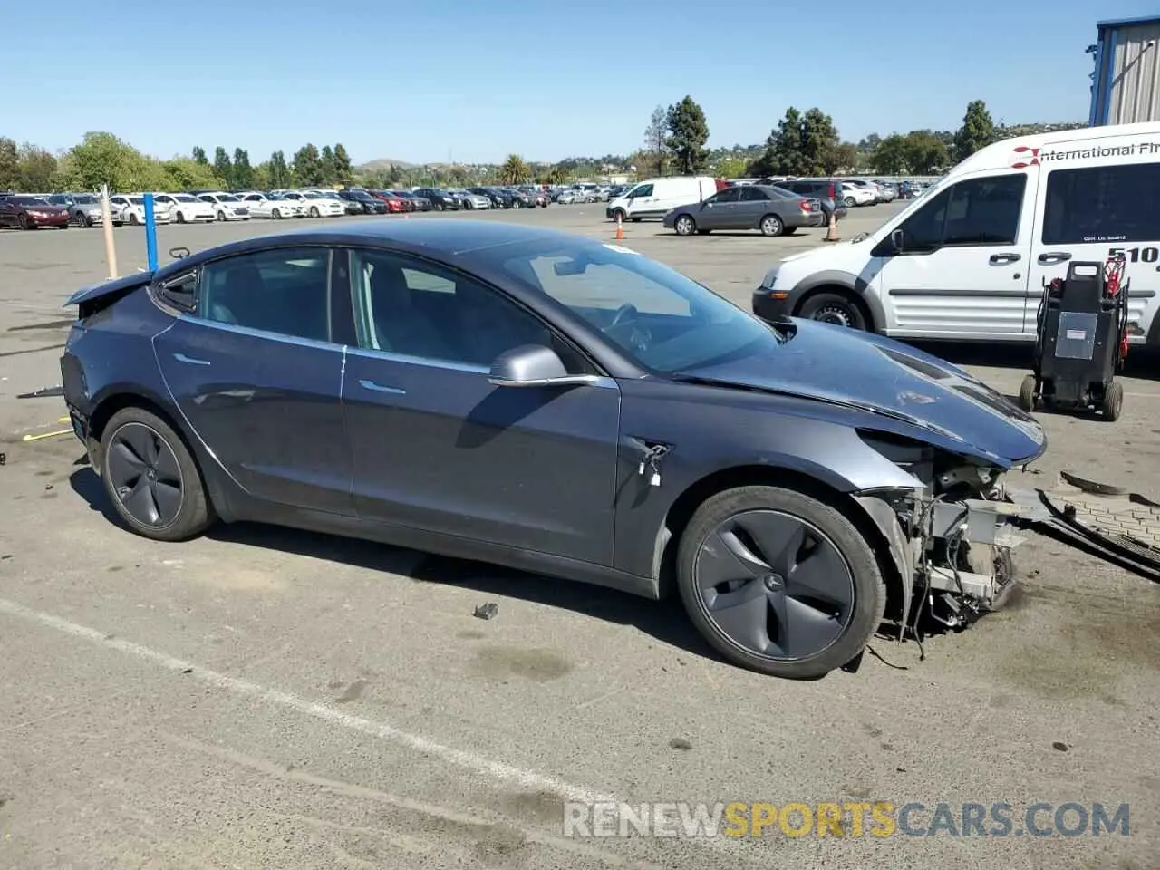 4 Photograph of a damaged car 5YJ3E1EB0LF710617 TESLA MODEL 3 2020
