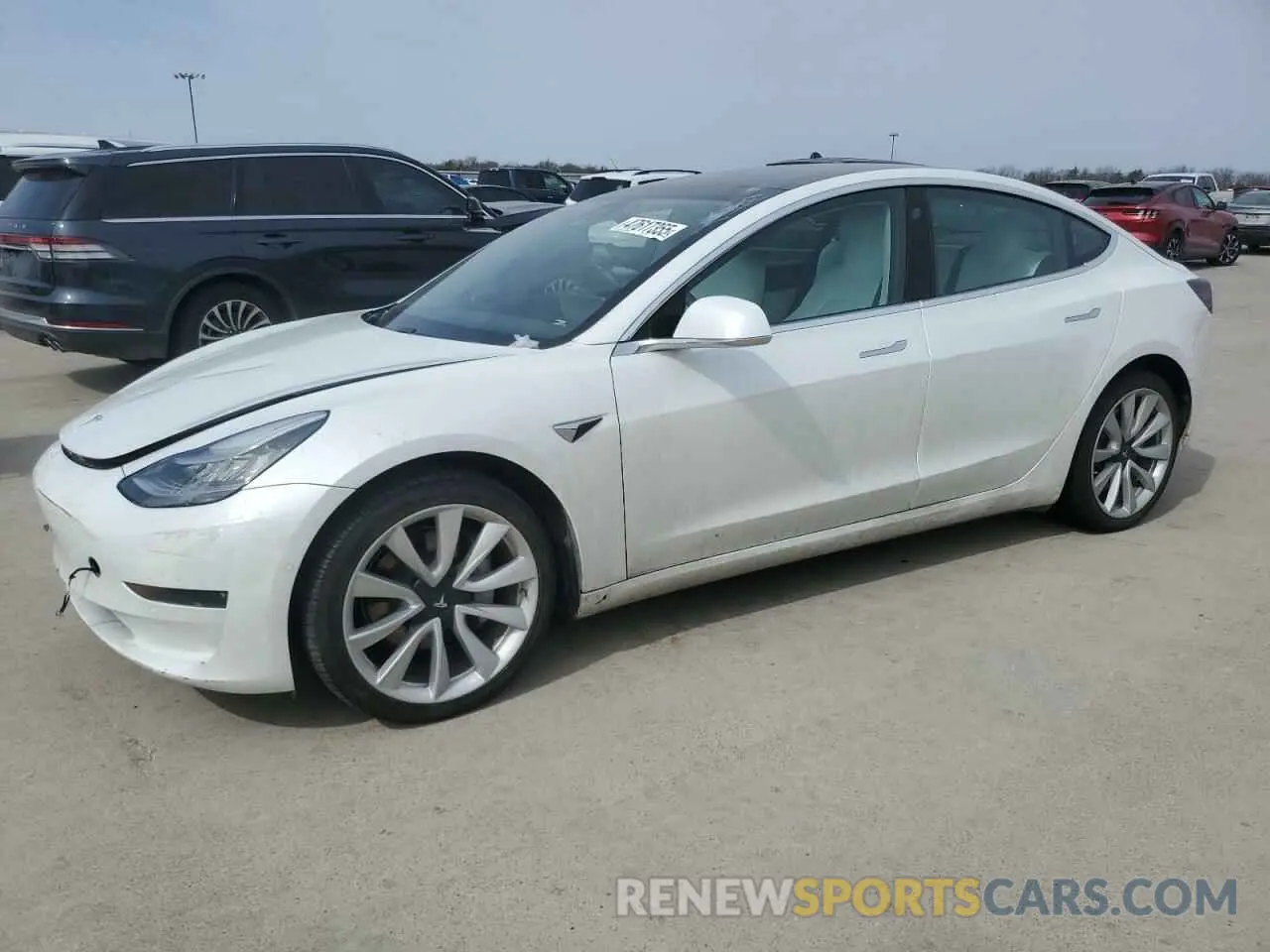 1 Photograph of a damaged car 5YJ3E1EB0LF713016 TESLA MODEL 3 2020