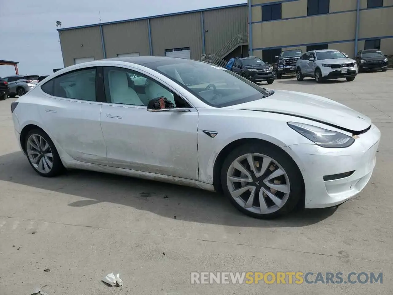 4 Photograph of a damaged car 5YJ3E1EB0LF713016 TESLA MODEL 3 2020