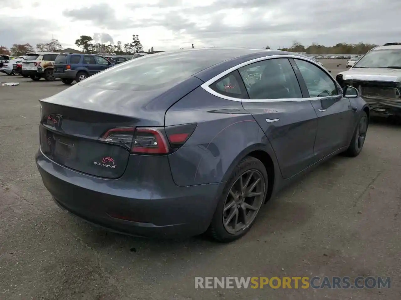 4 Photograph of a damaged car 5YJ3E1EB0LF717521 TESLA MODEL 3 2020