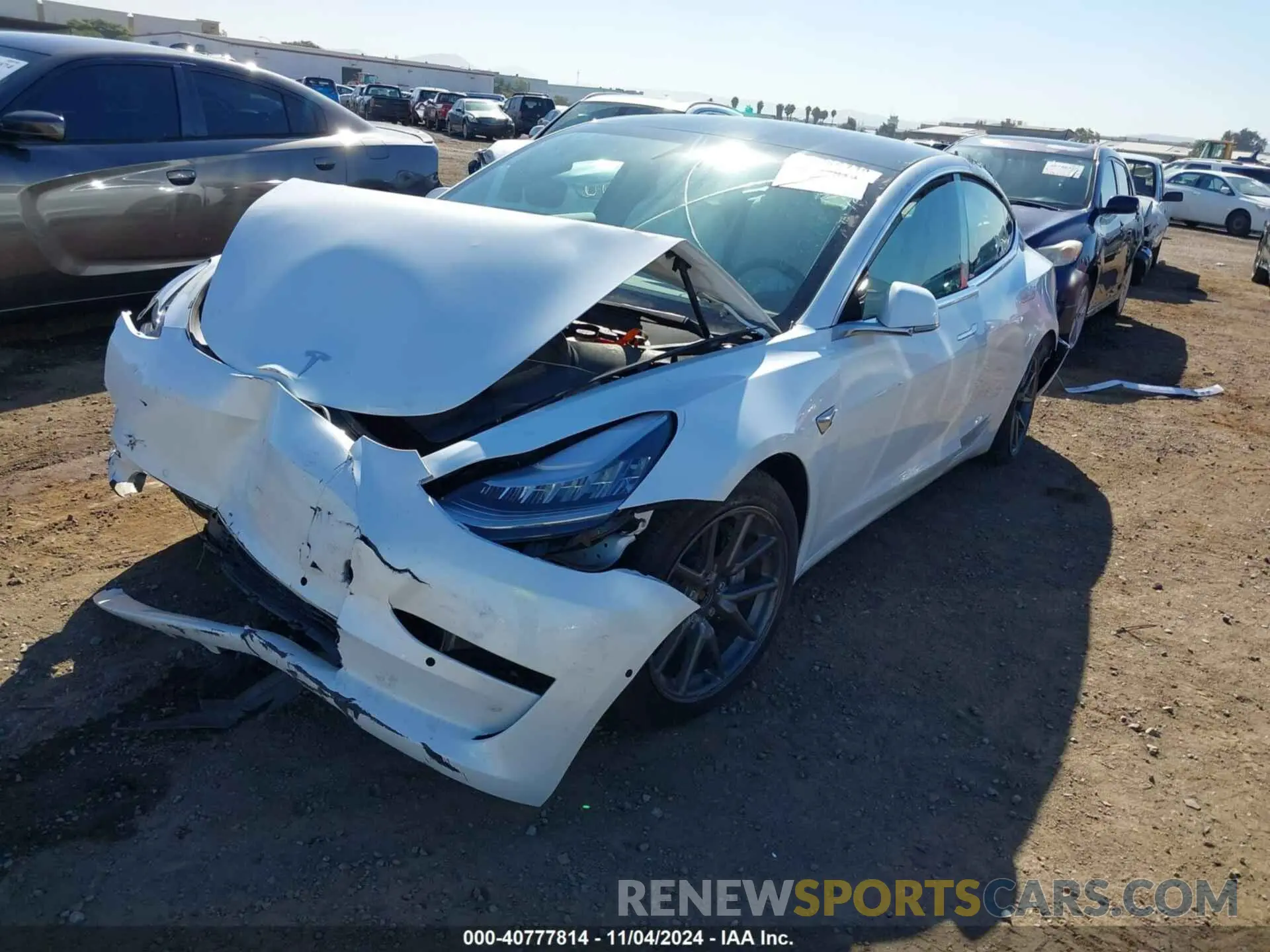 2 Photograph of a damaged car 5YJ3E1EB0LF720144 TESLA MODEL 3 2020