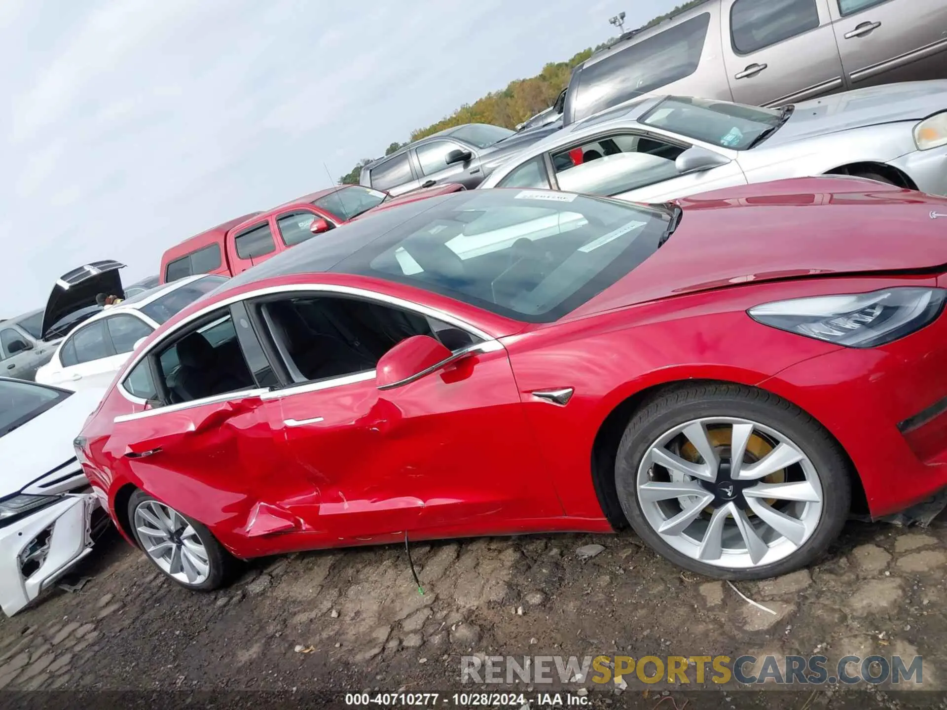 12 Photograph of a damaged car 5YJ3E1EB0LF735632 TESLA MODEL 3 2020