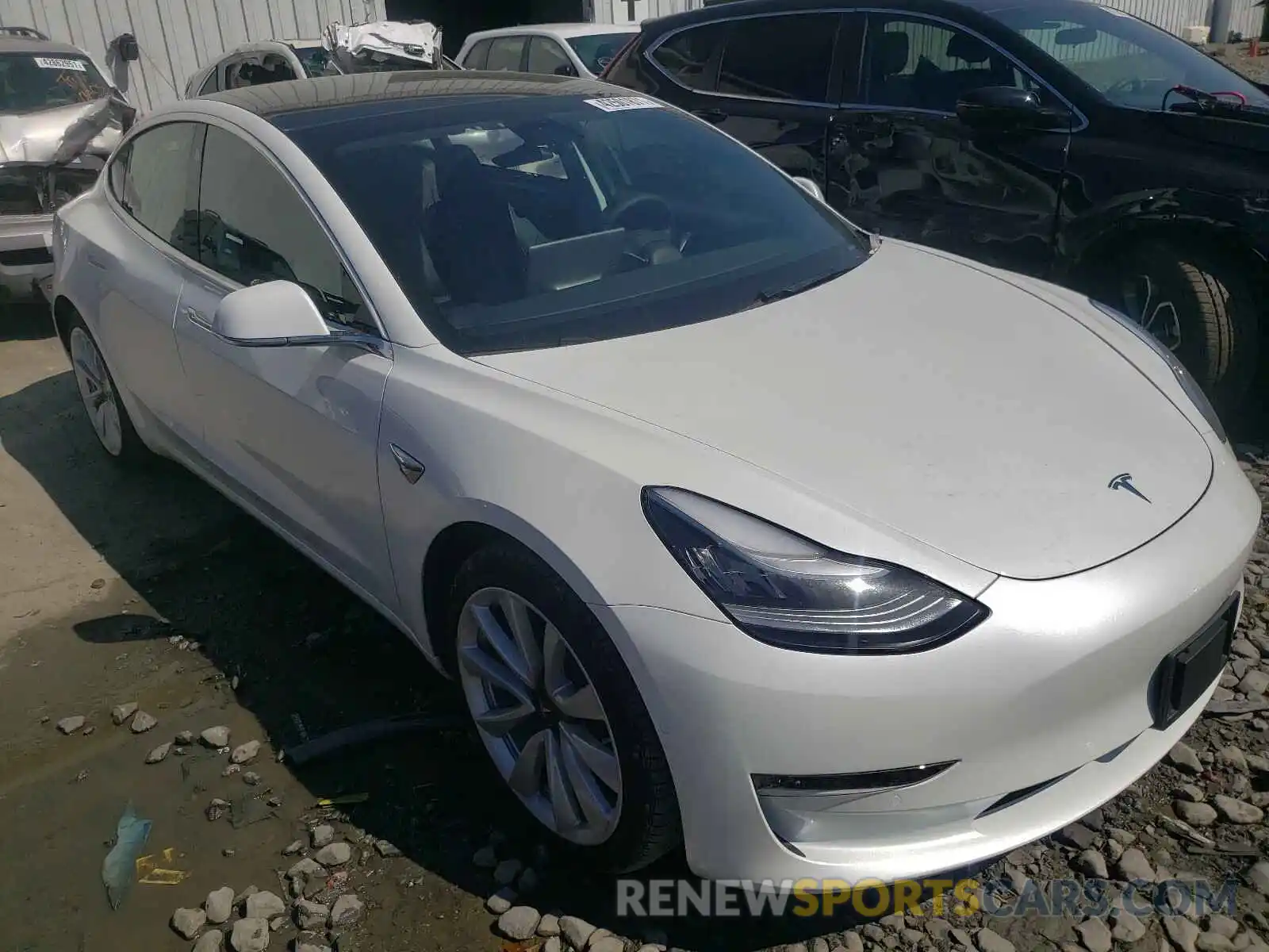 1 Photograph of a damaged car 5YJ3E1EB0LF735663 TESLA MODEL 3 2020