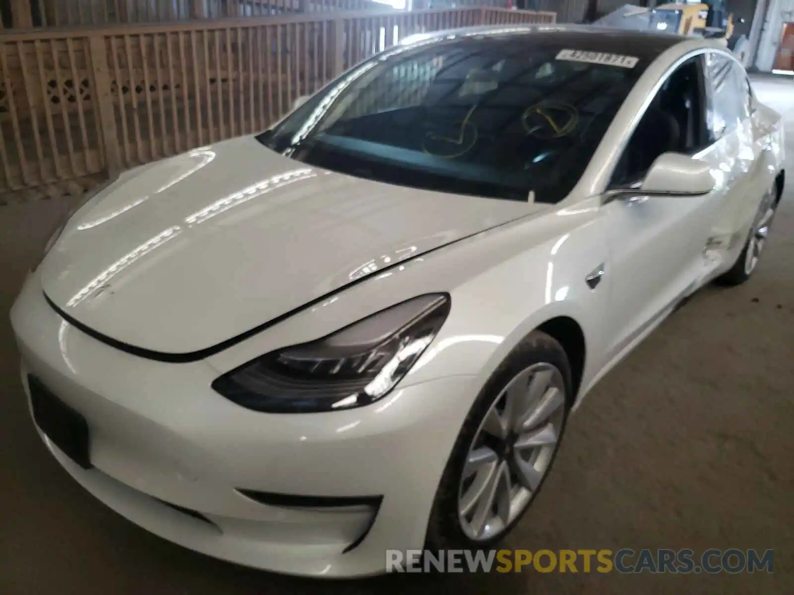 2 Photograph of a damaged car 5YJ3E1EB0LF735663 TESLA MODEL 3 2020