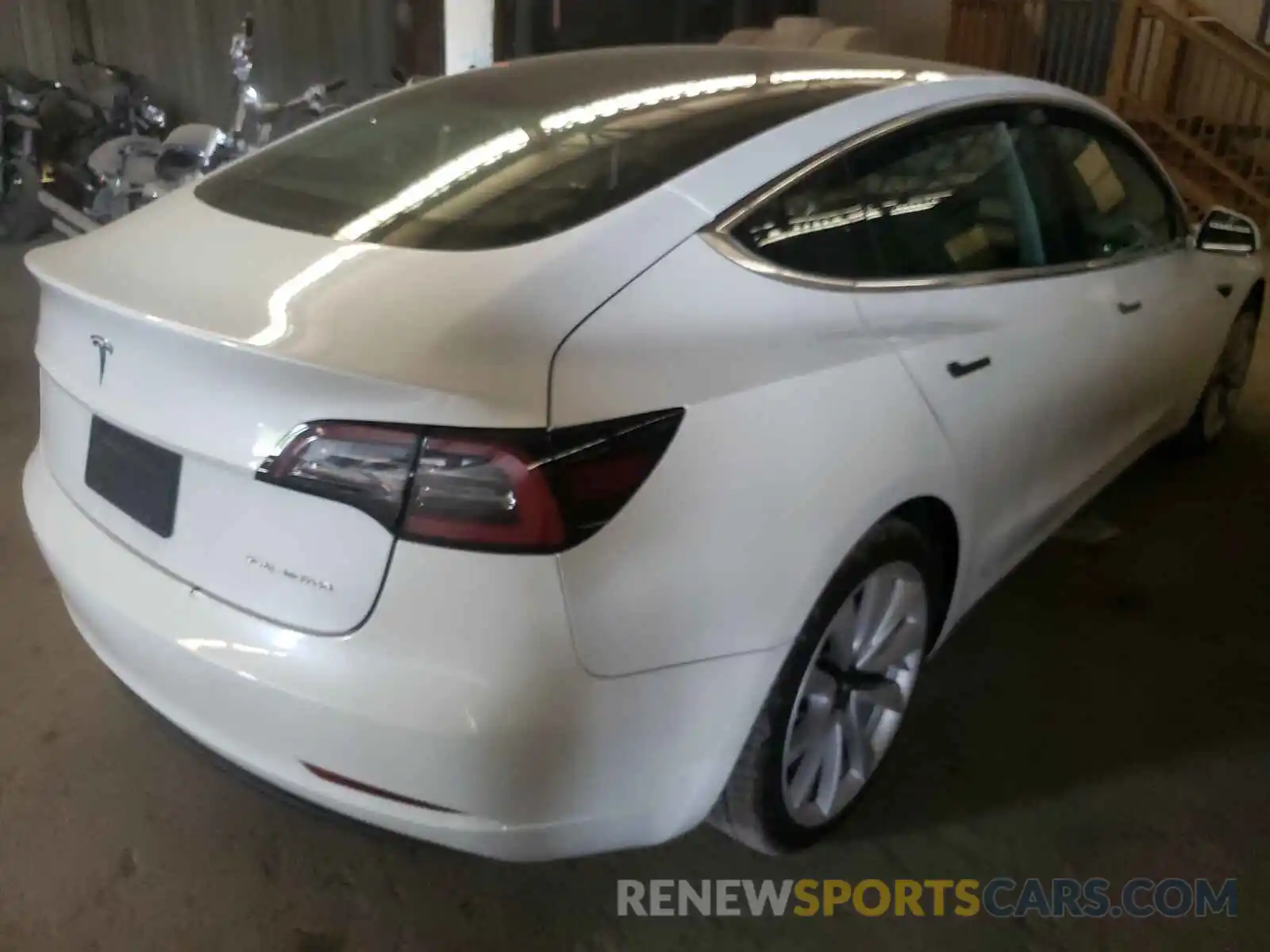 4 Photograph of a damaged car 5YJ3E1EB0LF735663 TESLA MODEL 3 2020