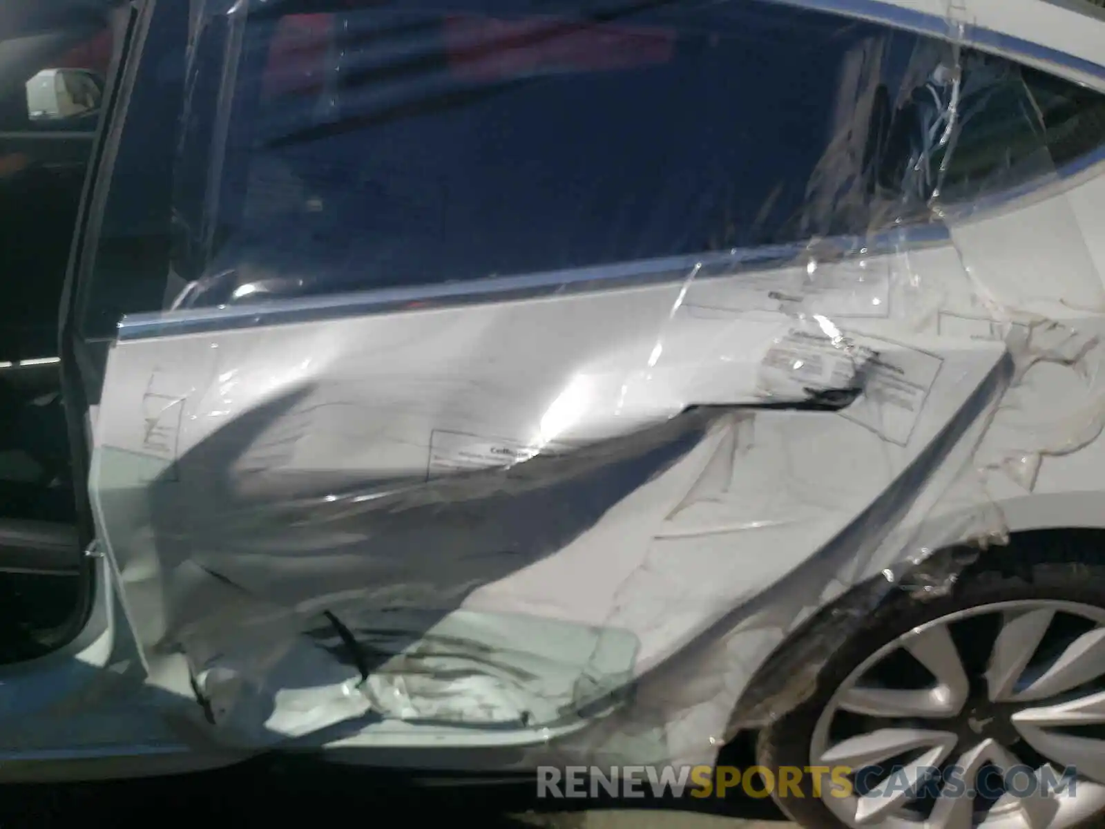 9 Photograph of a damaged car 5YJ3E1EB0LF735663 TESLA MODEL 3 2020