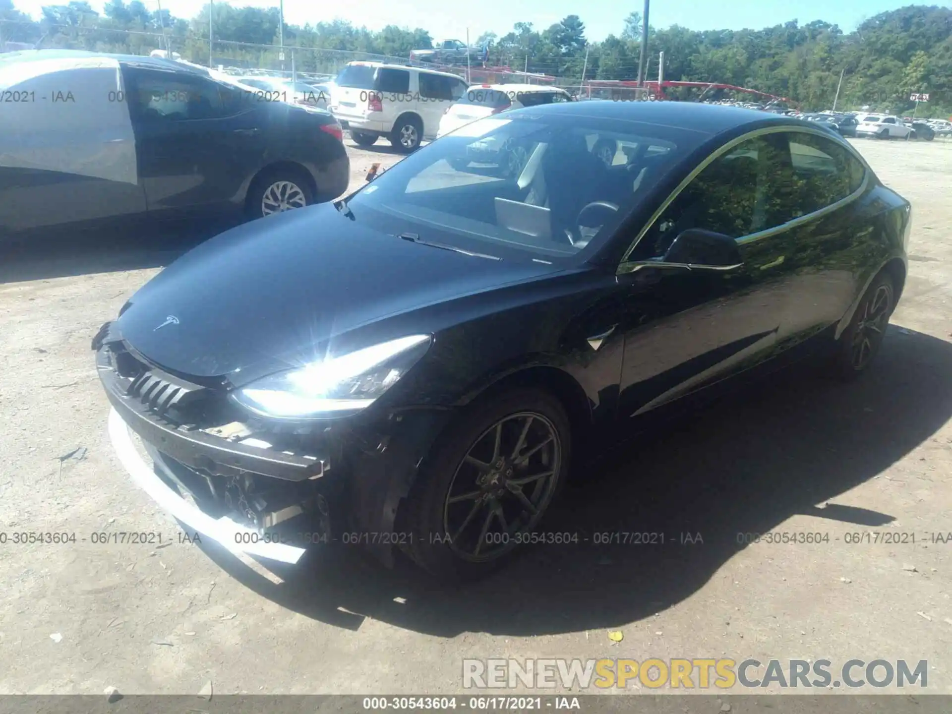 2 Photograph of a damaged car 5YJ3E1EB0LF790209 TESLA MODEL 3 2020