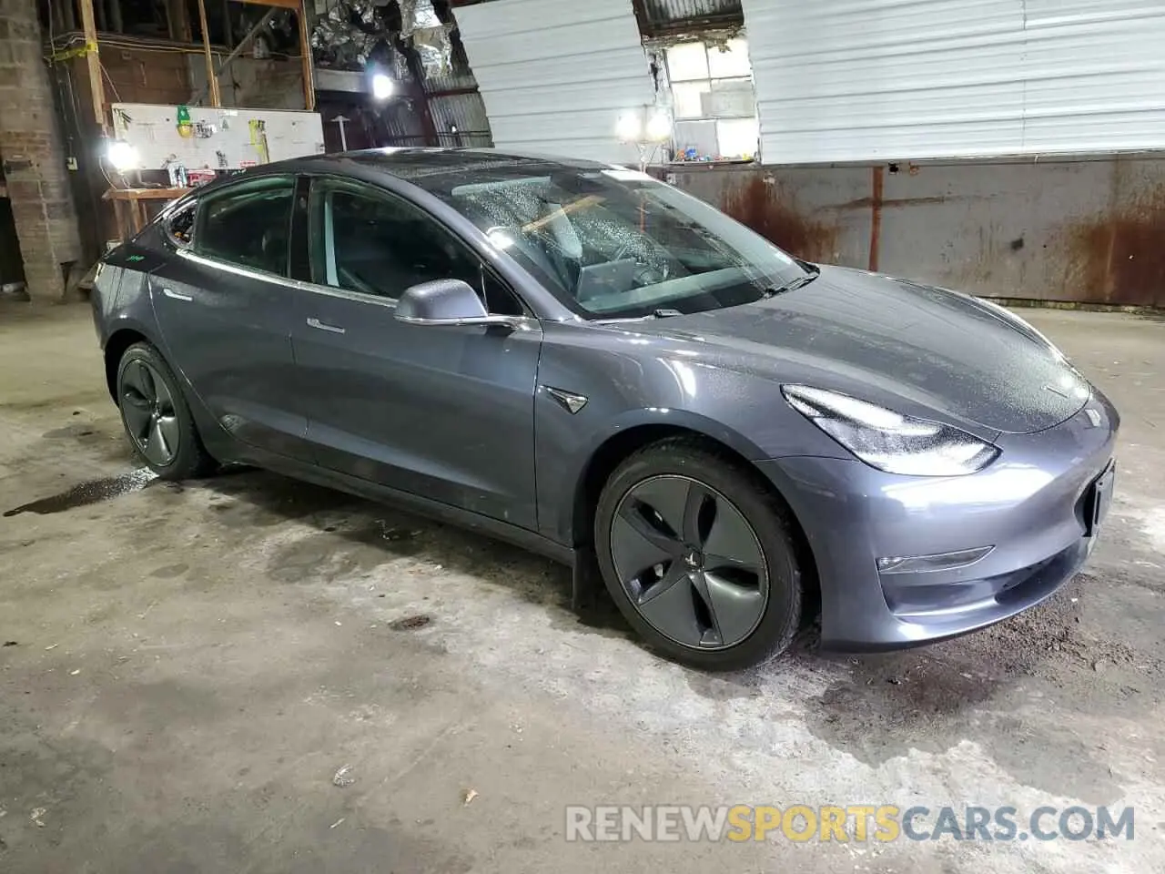 4 Photograph of a damaged car 5YJ3E1EB0LF793577 TESLA MODEL 3 2020