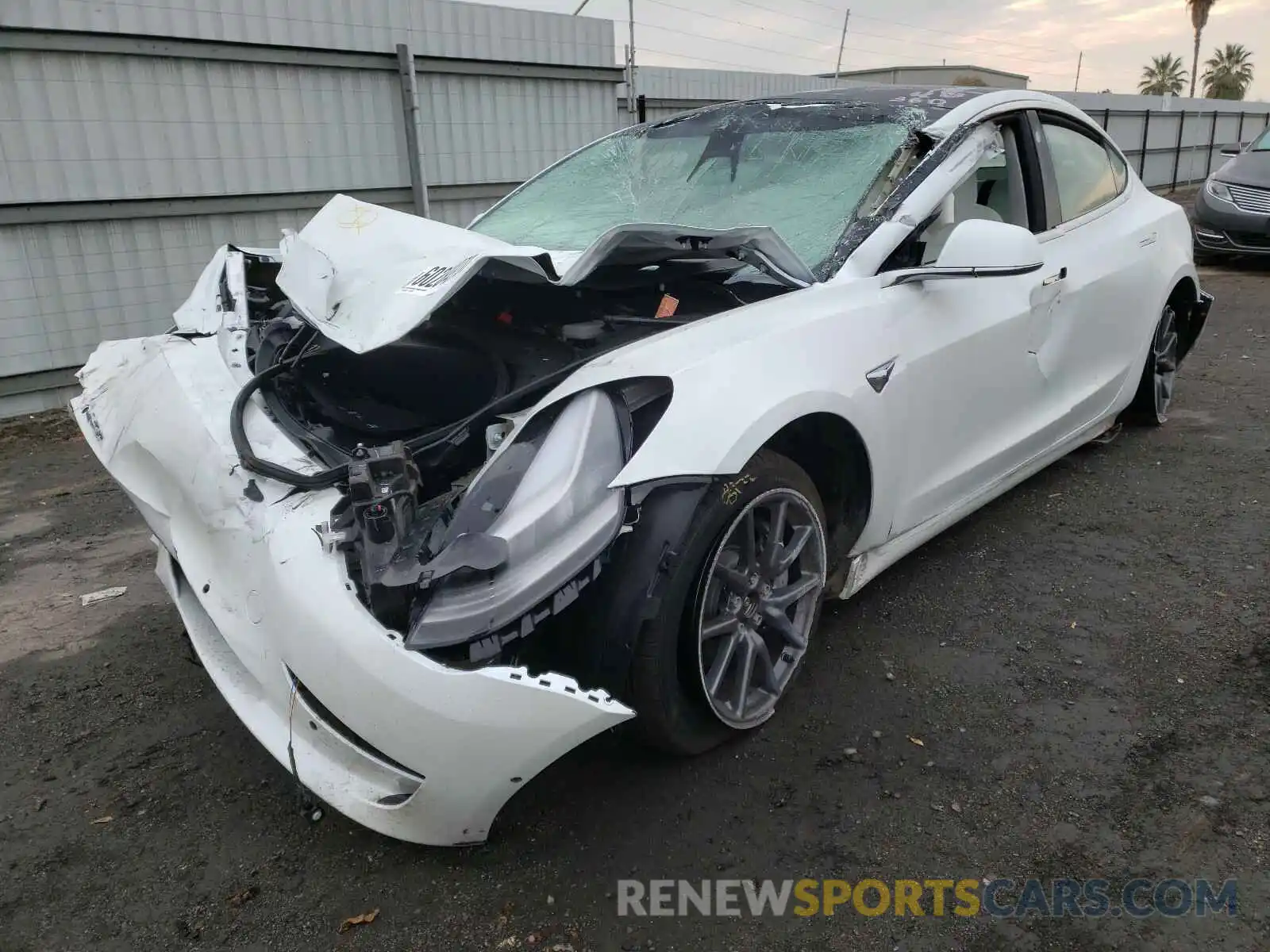 2 Photograph of a damaged car 5YJ3E1EB0LF801726 TESLA MODEL 3 2020